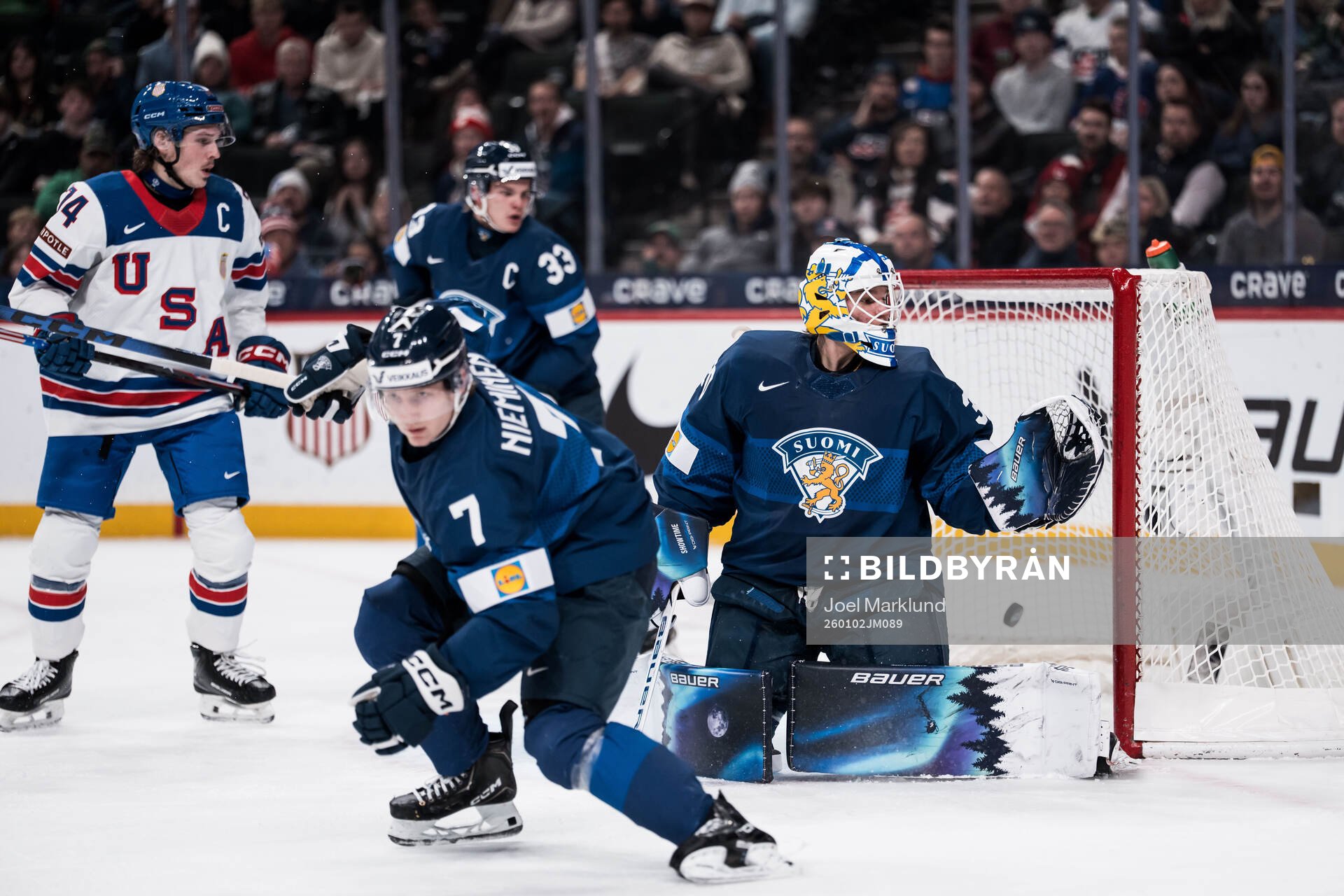 Goaltender Petteri Rimpinen of Finland lets in the 2-1 goal