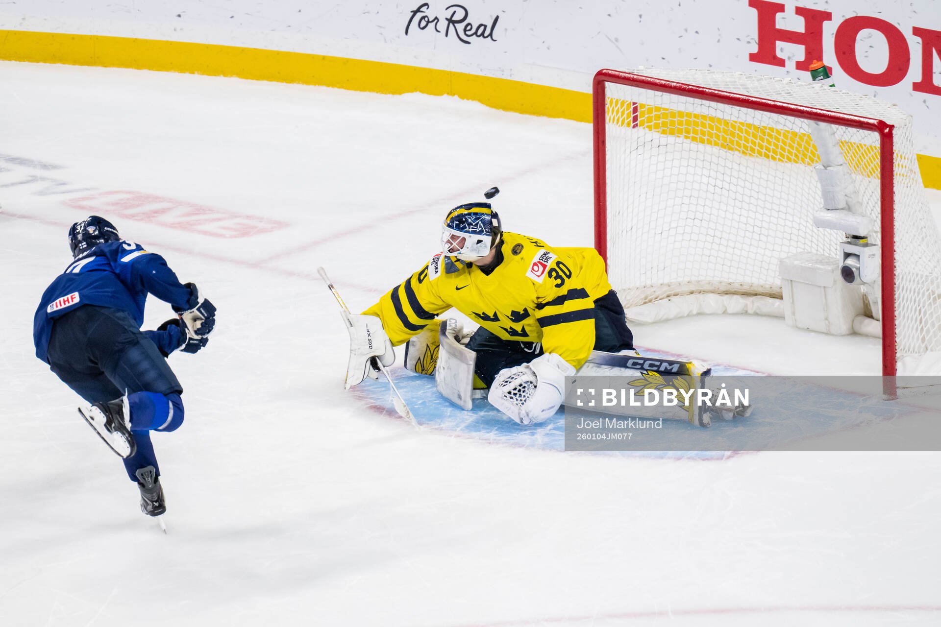 Matias Vanhanen of Finland and goaltender Love Härenstam