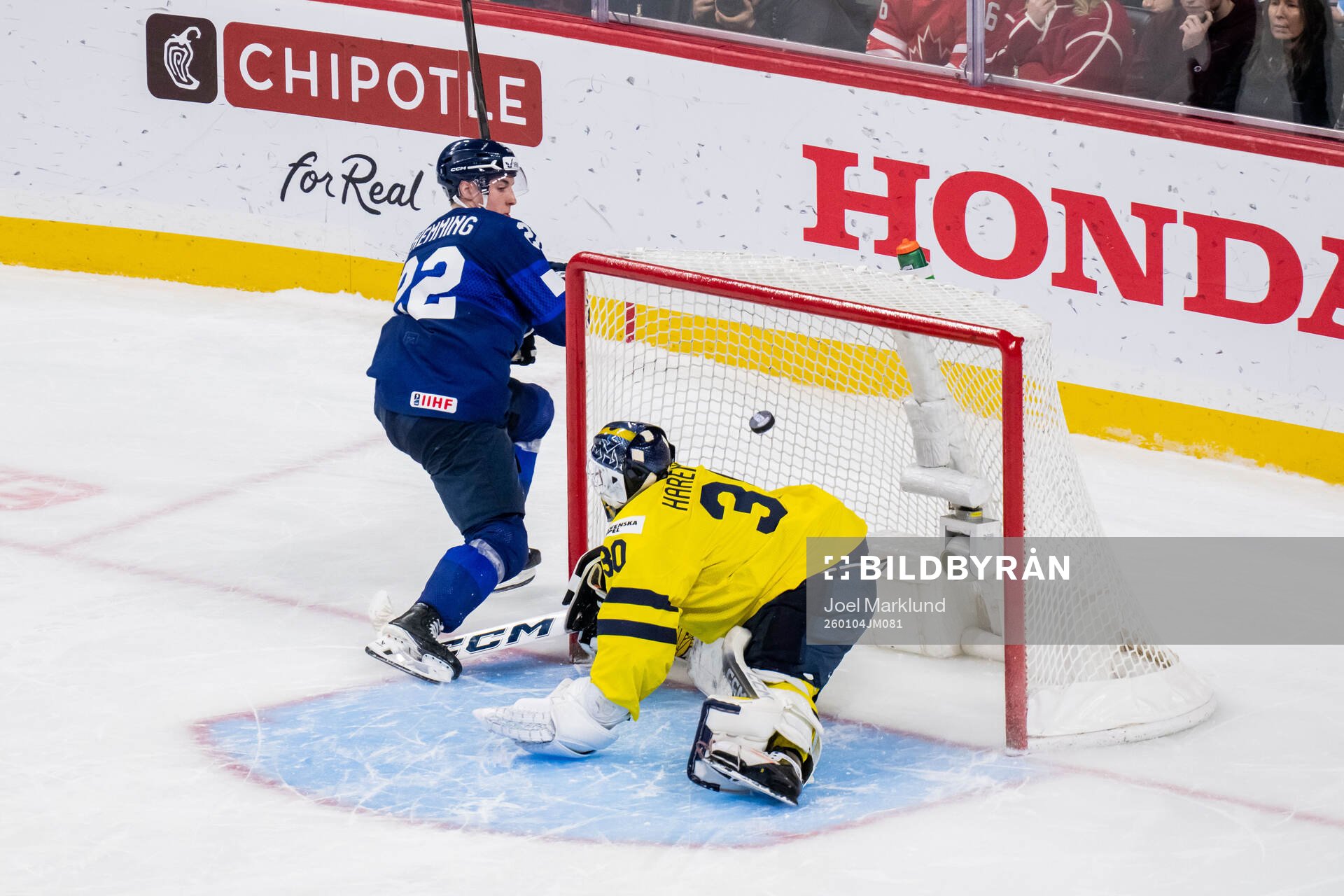 Emil Hemming of Finland and goaltender Love Härenstam of