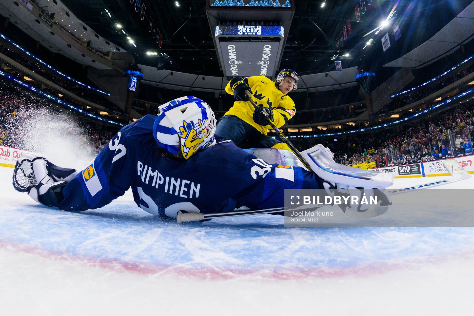 Goaltender Petteri Rimpinen of Finland saves a shot from