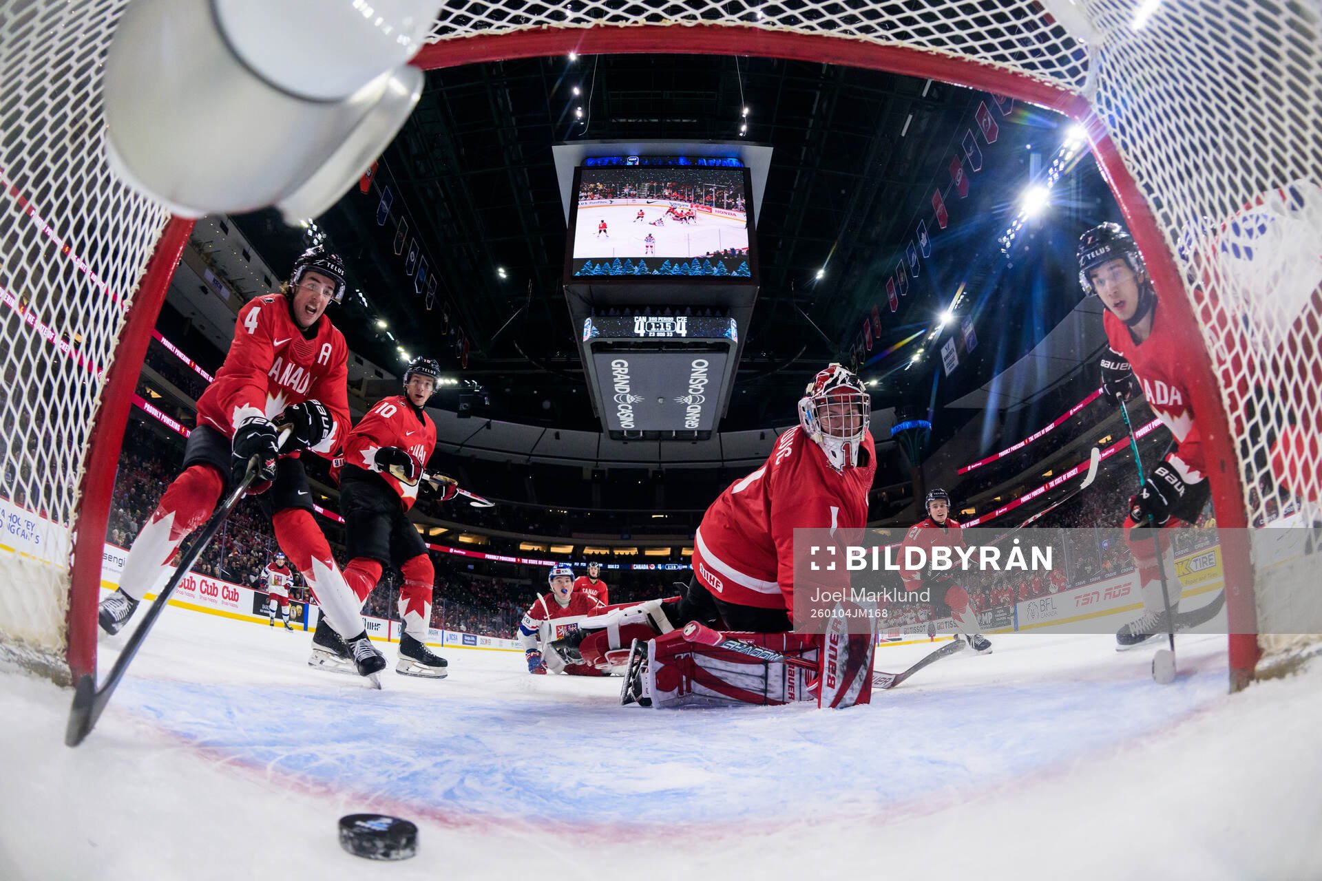 Goaltender Jack Ivankovic of Canada lets in the 4-5 goal by
