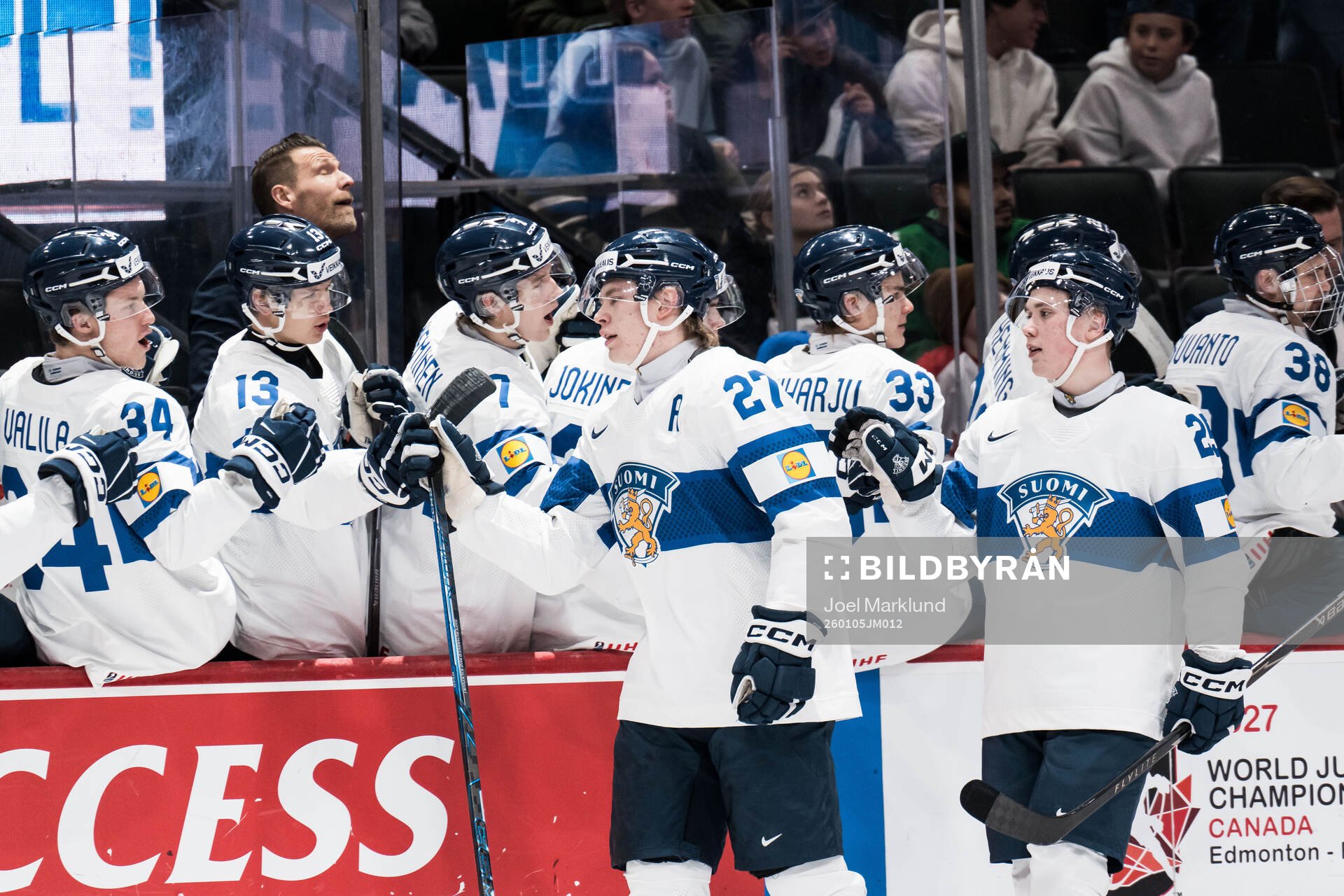 Julius Miettinen and Lasse Boelius of Finland celebrates