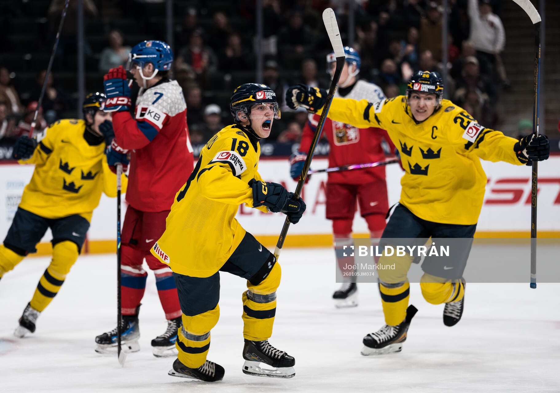 Victor Eklund and Jack Berglund of Sweden celebrate