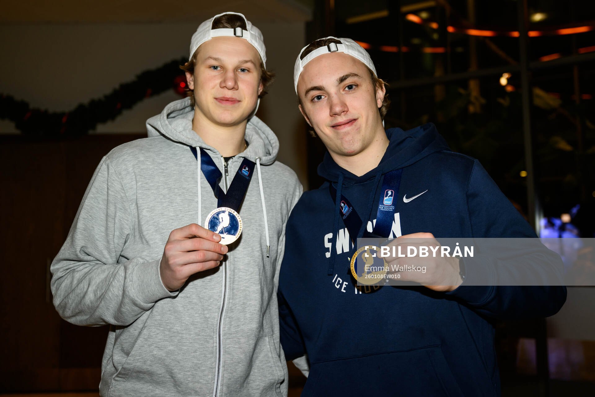 Eddie Genborg and Linus Eriksson of Sweden pose for a photo