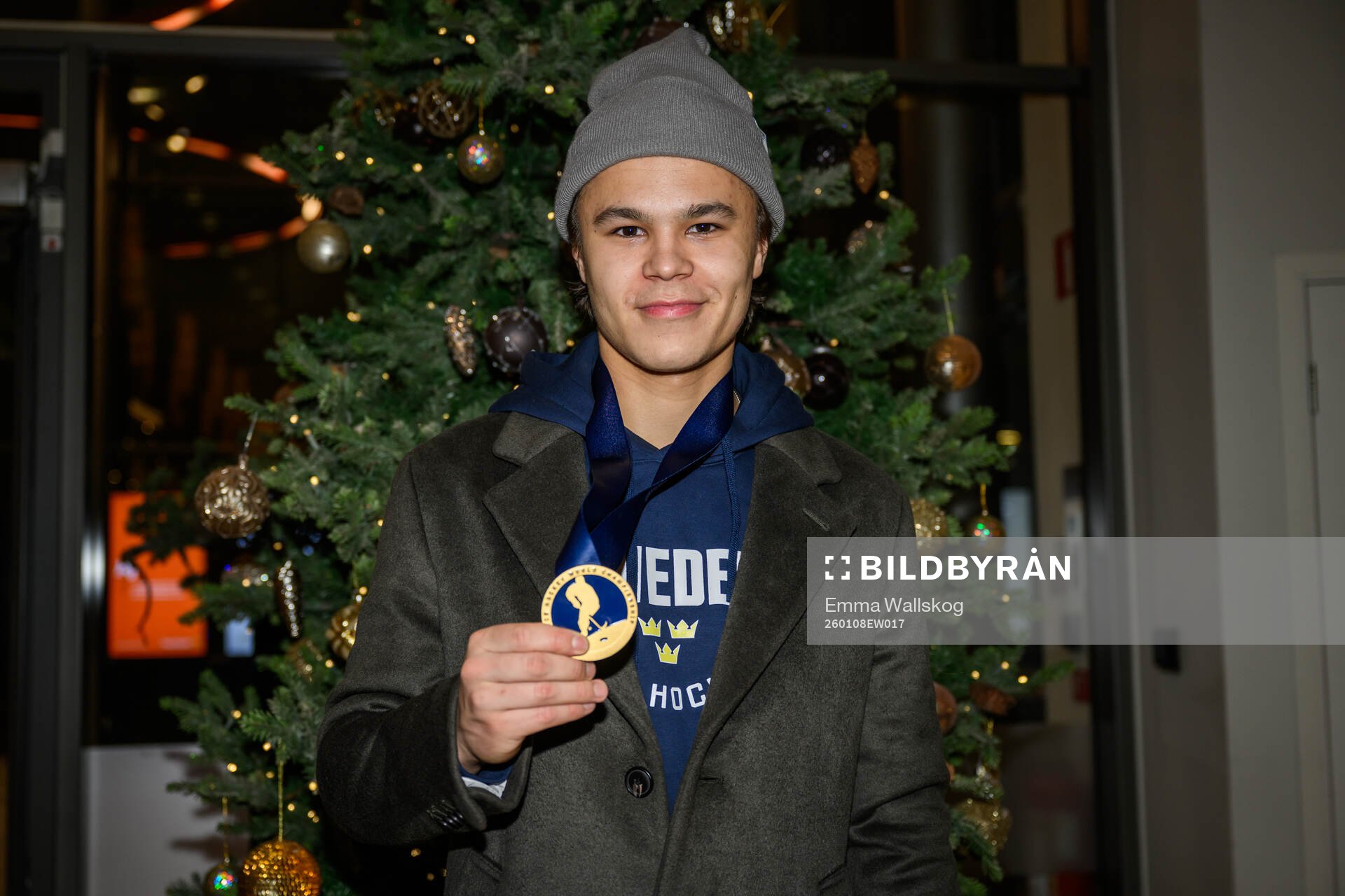 goaltender Herman Liv of Sweden poses for a photo with his