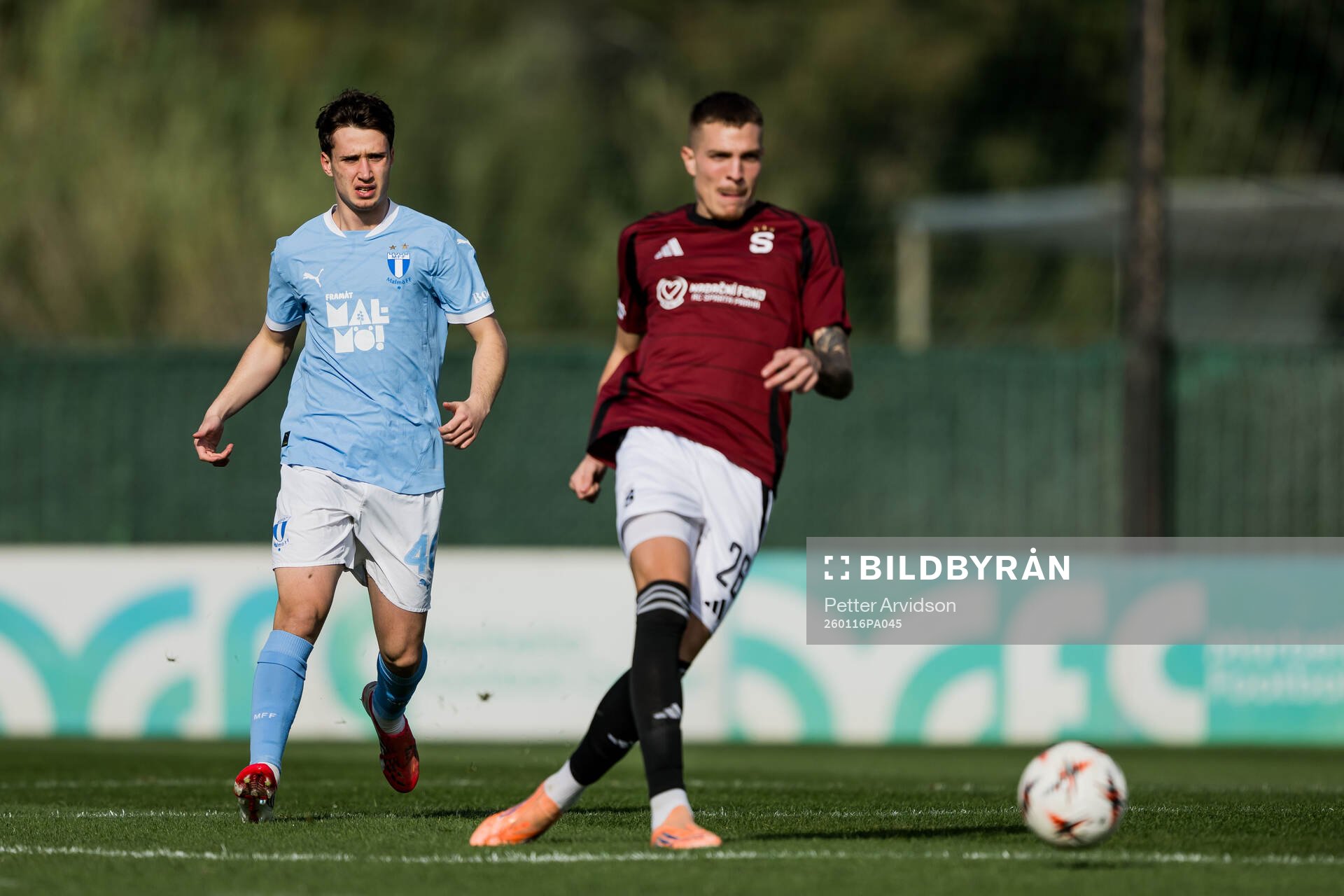 Kenan Busuladzic of Malmö FF and Patrik Vydra of Sparta