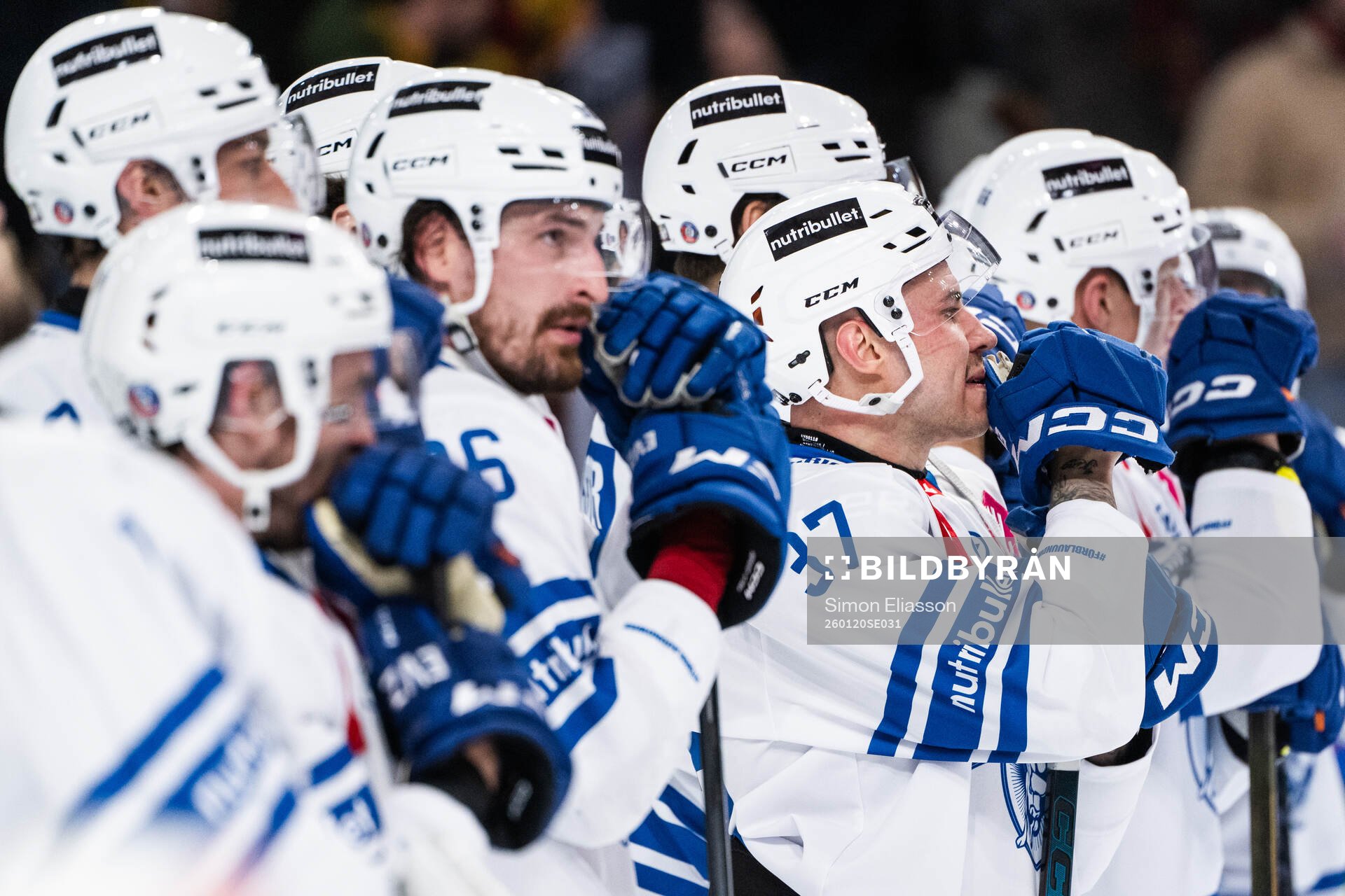 Daniel Voženilek and Elia Riva of EV Zug looks dejected