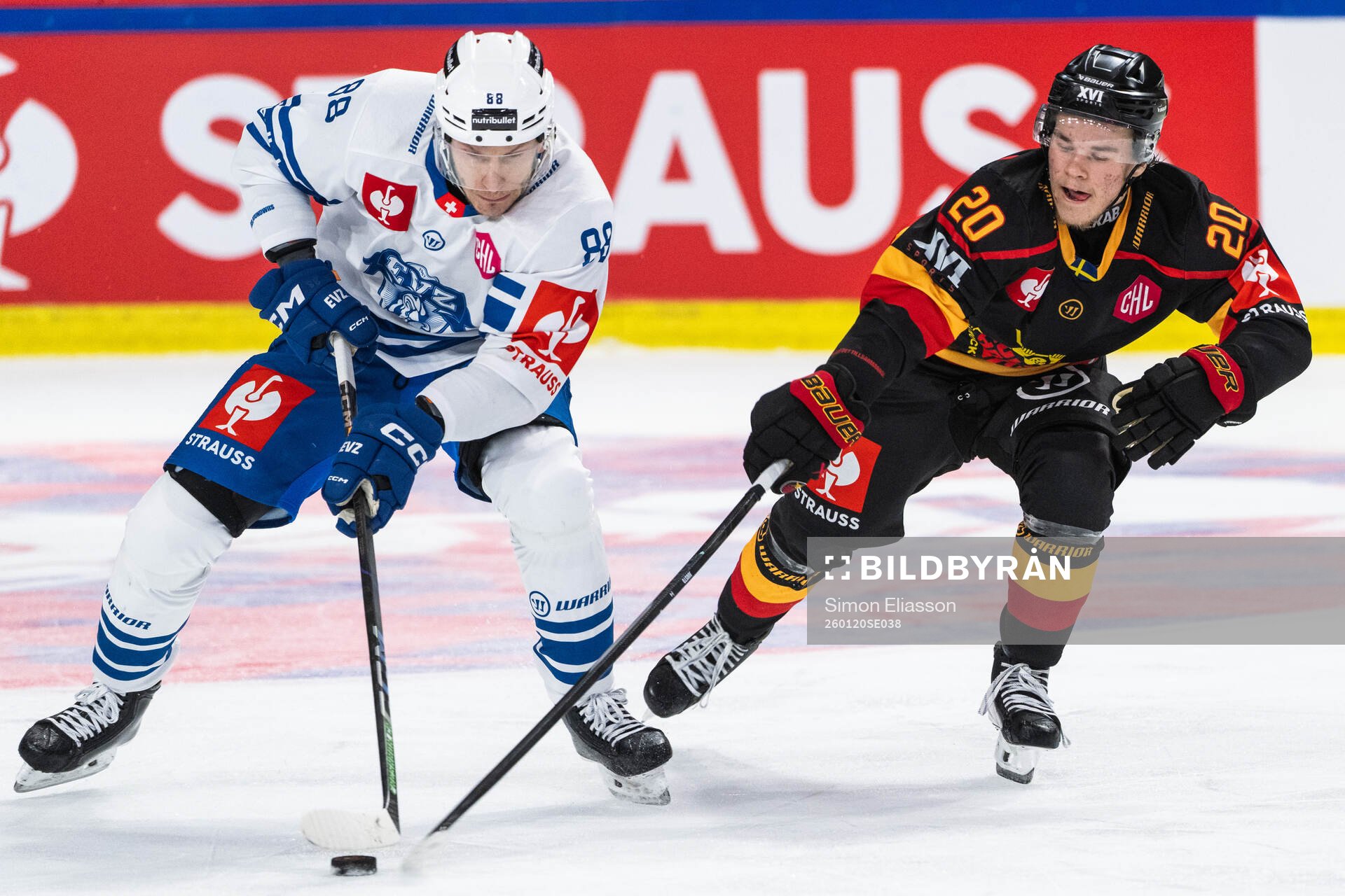 Sven Senteler of EV Zug and Casper Juustovaara Karlsson of