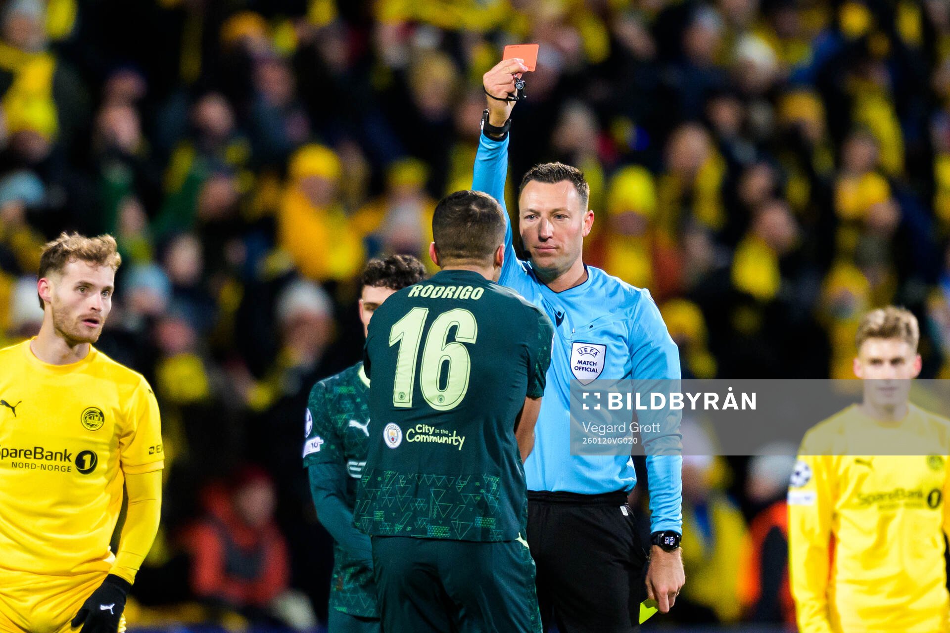 Rodri of Manchester City receives a red card