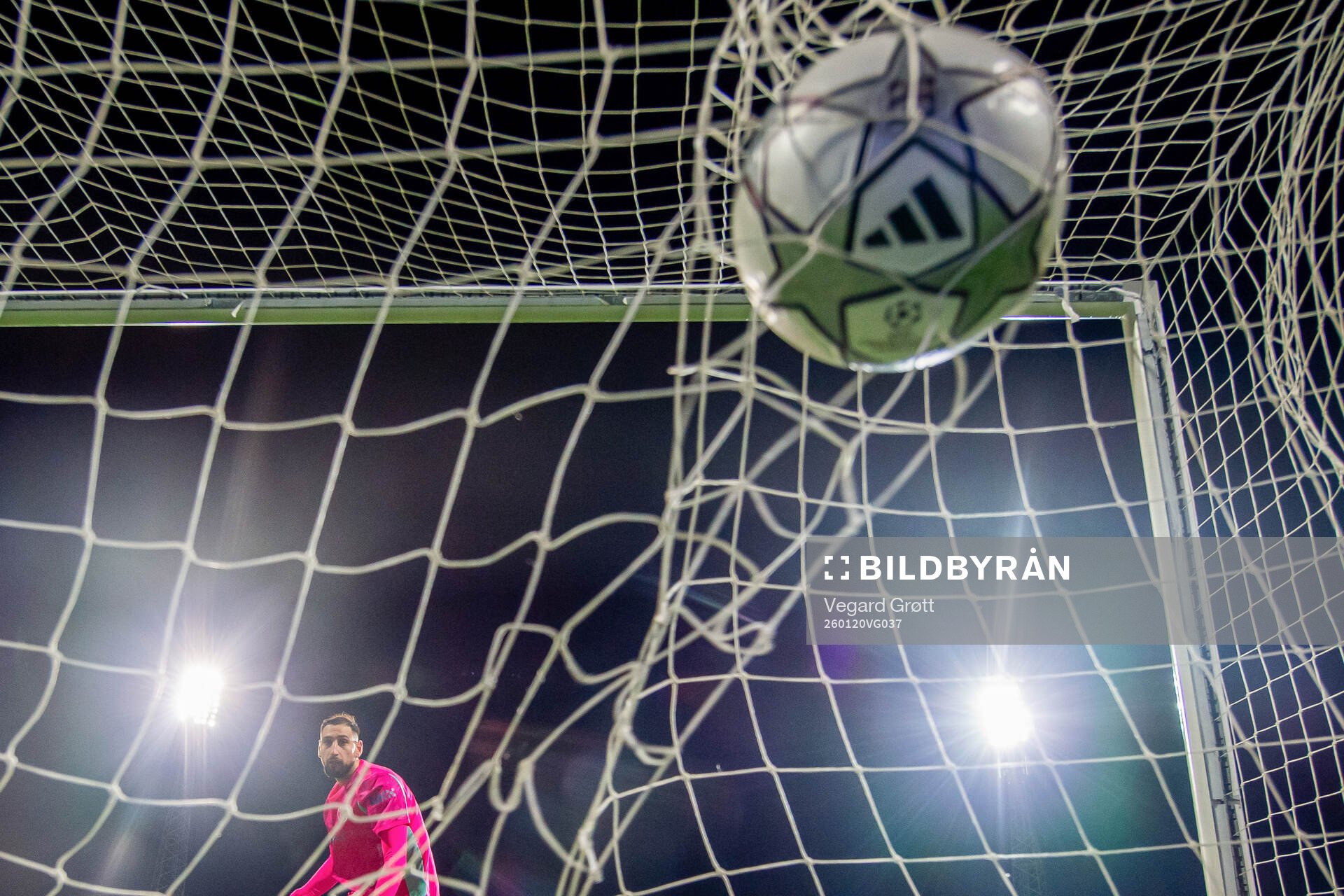 Goalkeeper Gianluigi Donnarumma of Manchester City lets in