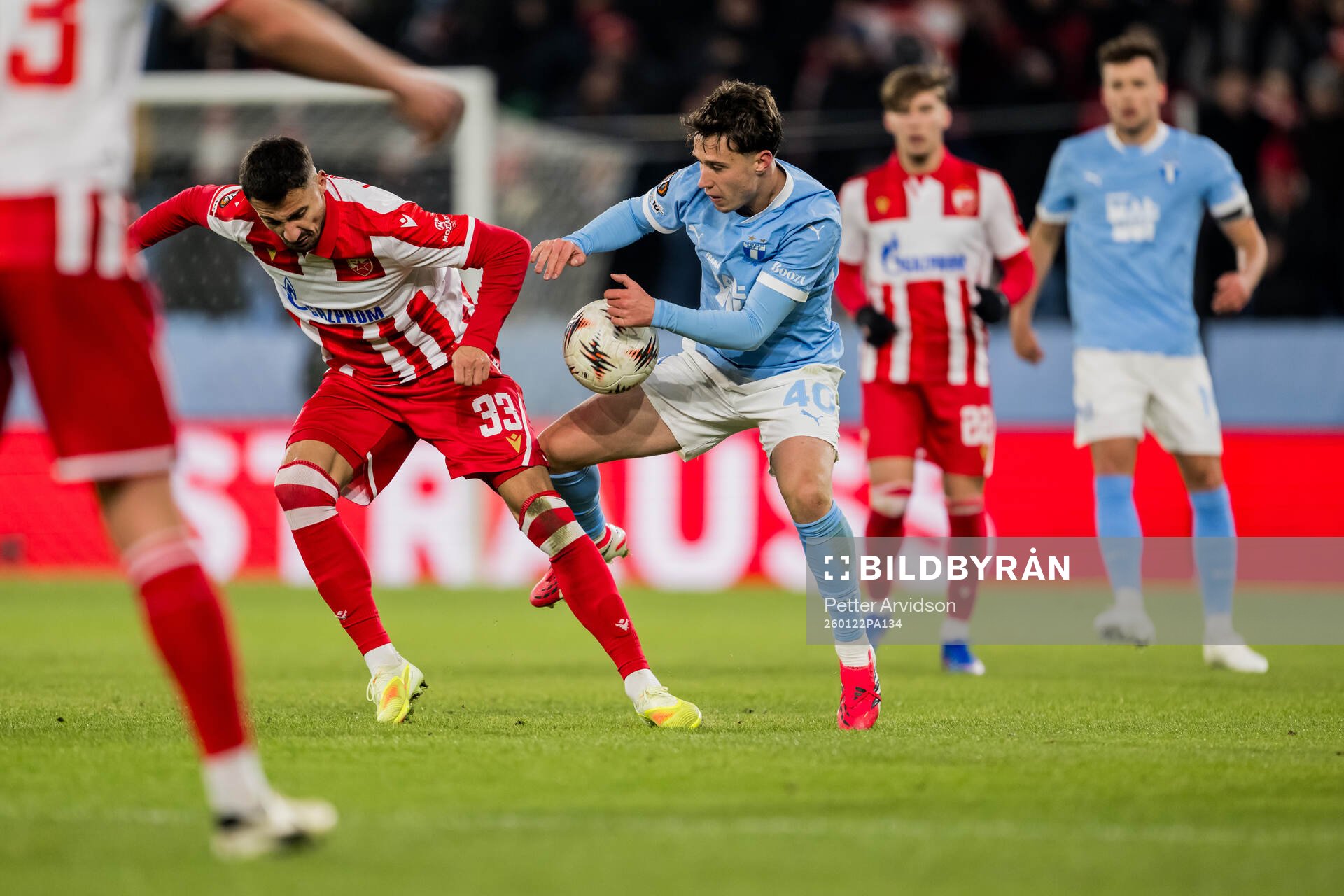 Rade Krunic of Crvena Zvezda and Kenan Busuladzic of Malmö