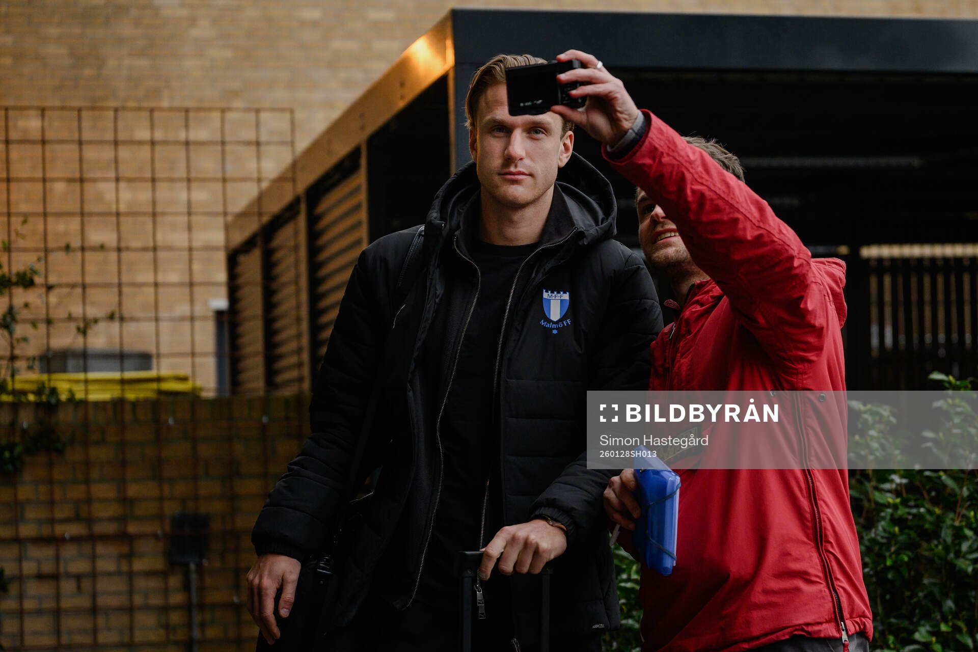 Erik Botheim of Malmö FF takes a selfie with a fan at the