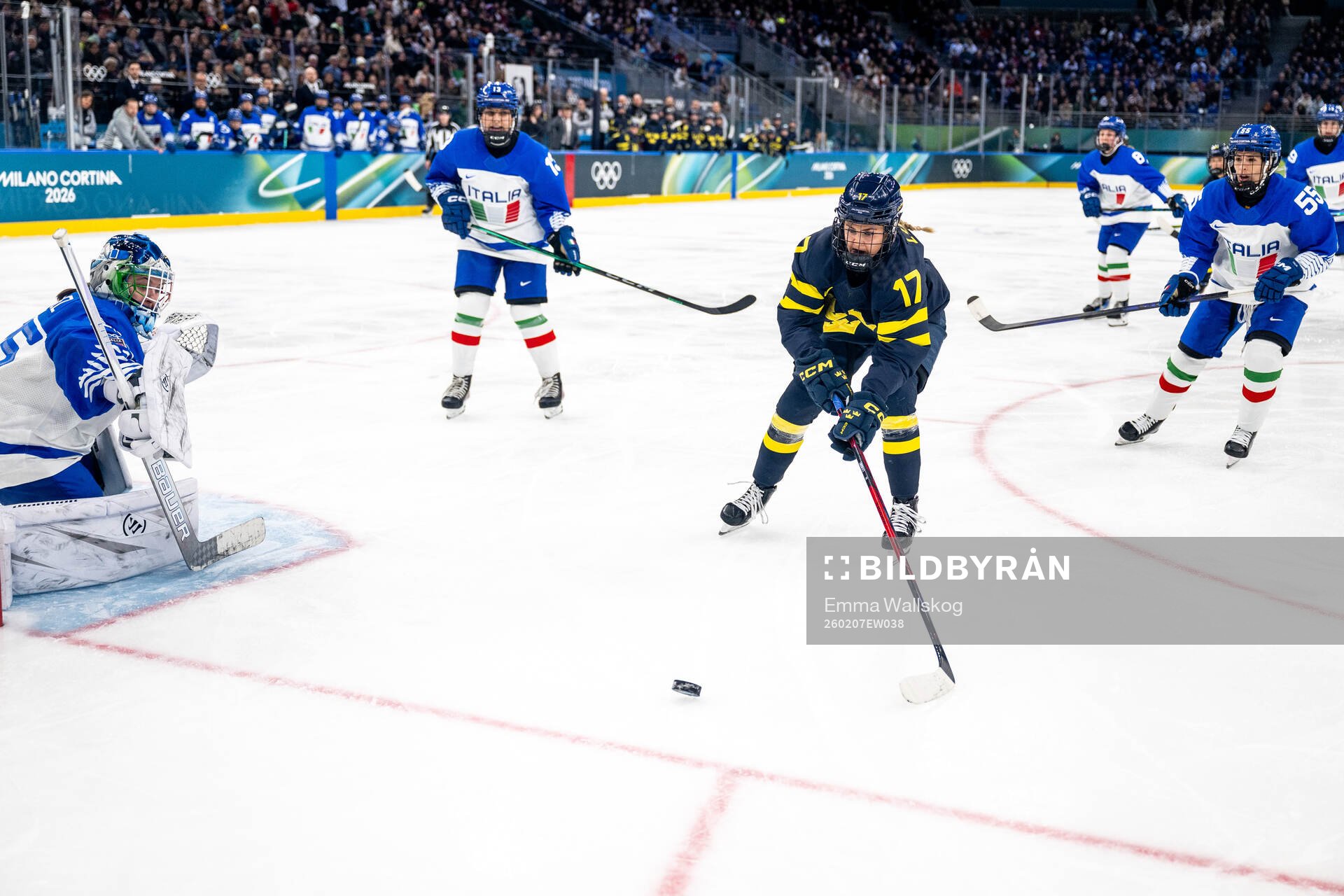Goaltender Martina Fedel of Italy and Sofie Lundin of