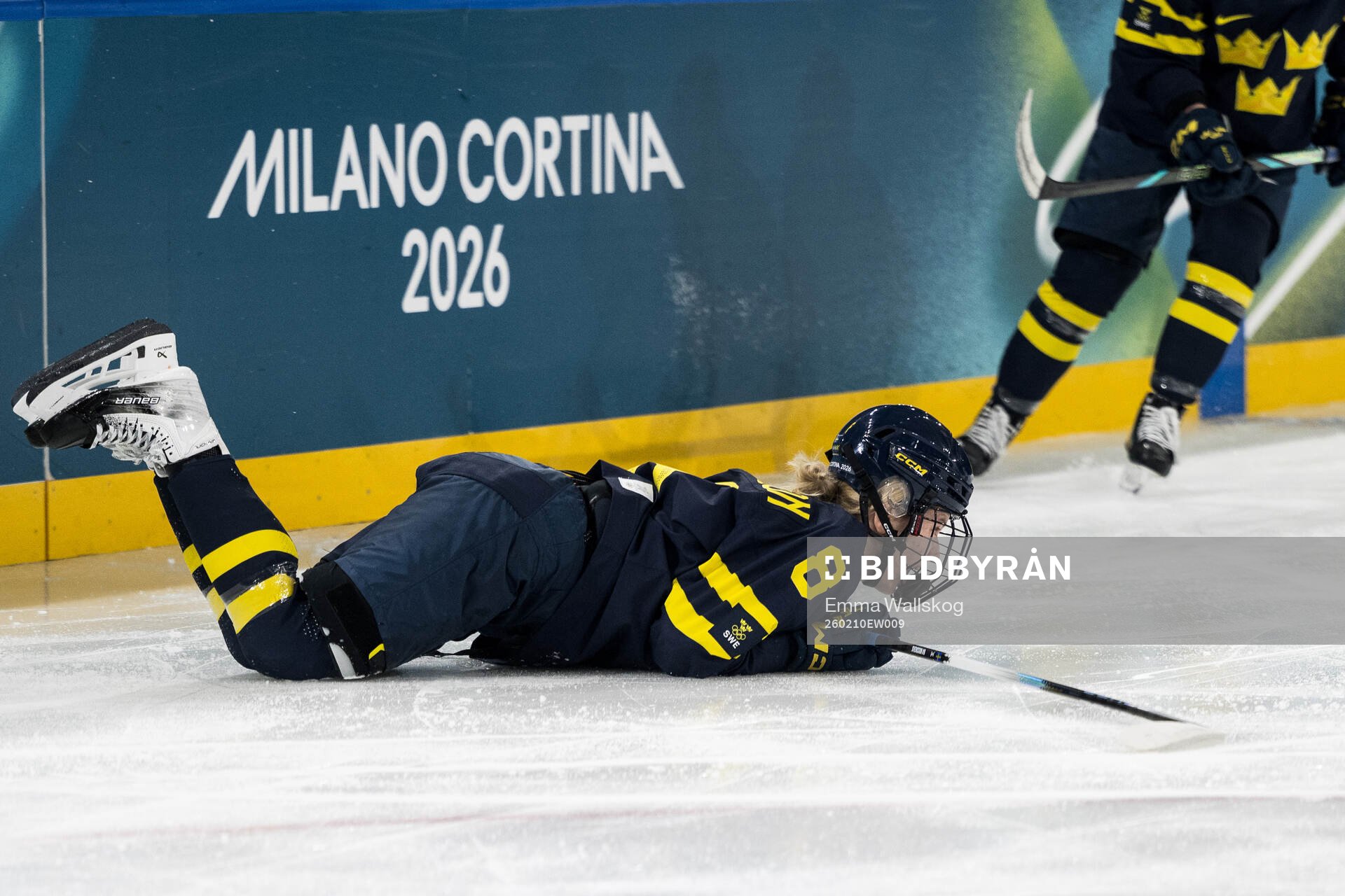 Hilda Svensson of Sweden in pain in the women's ice hockey