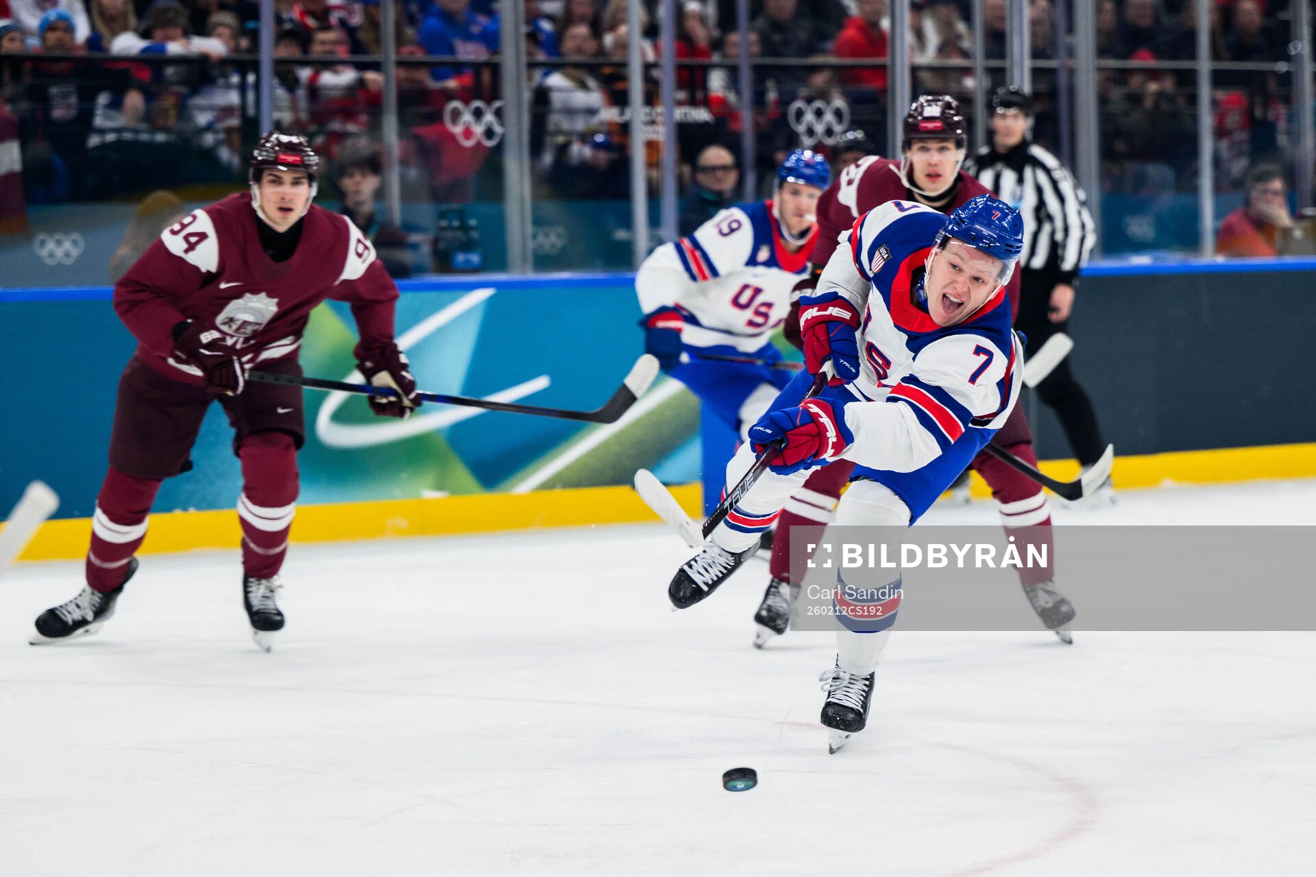 Brady Tkachuk of USA scores the 1-0 goal in the men's ice