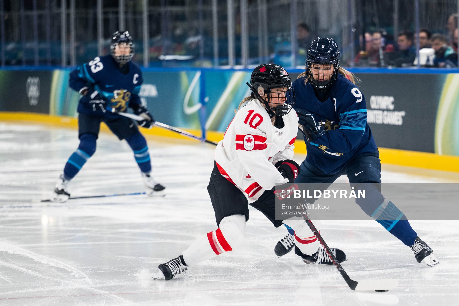 Sarah Fillier of Canada and Nelli Laitinen of Finland in
