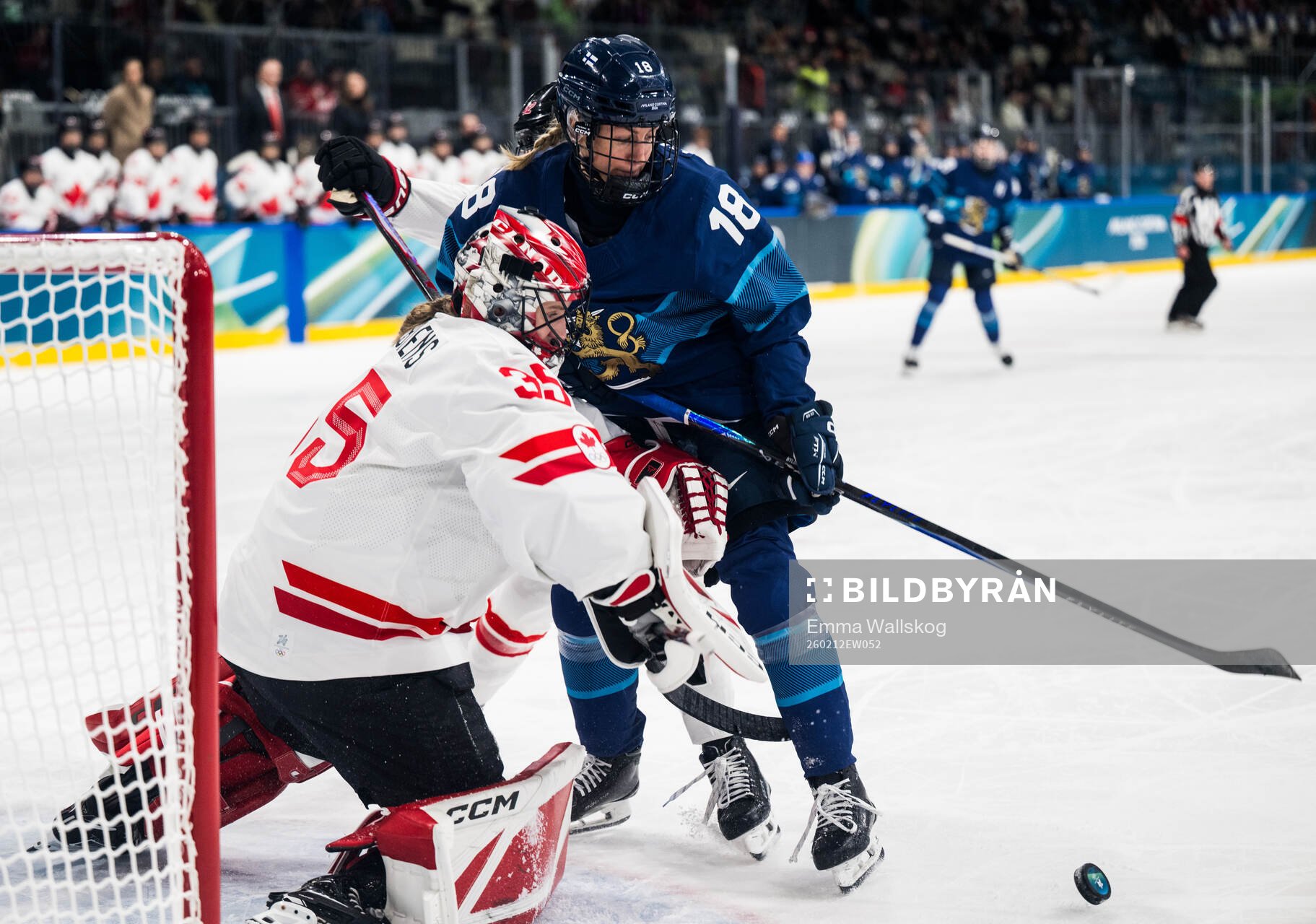 goaltender Ann-Renee Desbiens of Canada and Jenniina Nylund