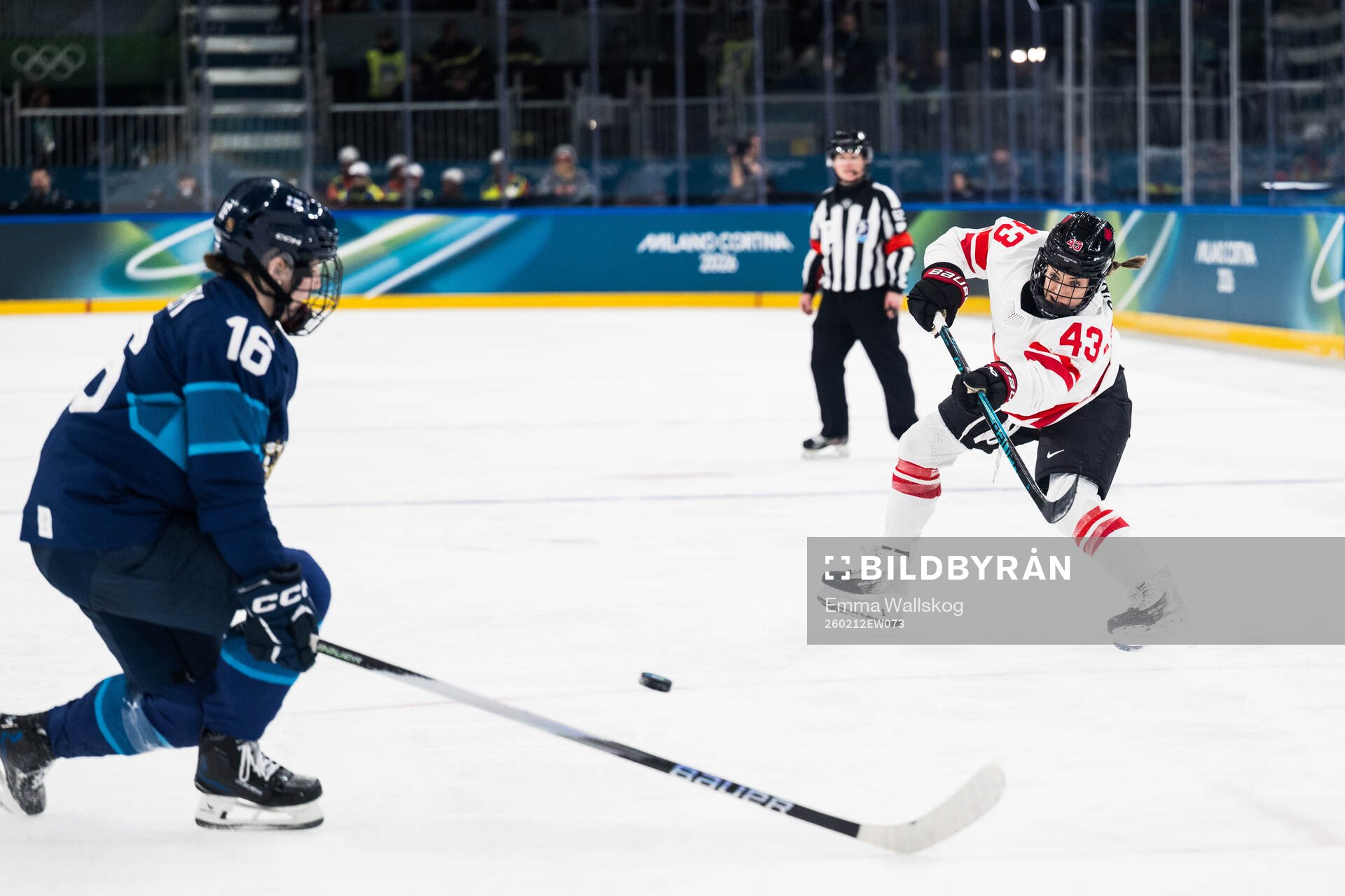Kristin O'Neill of Canada scores 0-3 in the women's ice