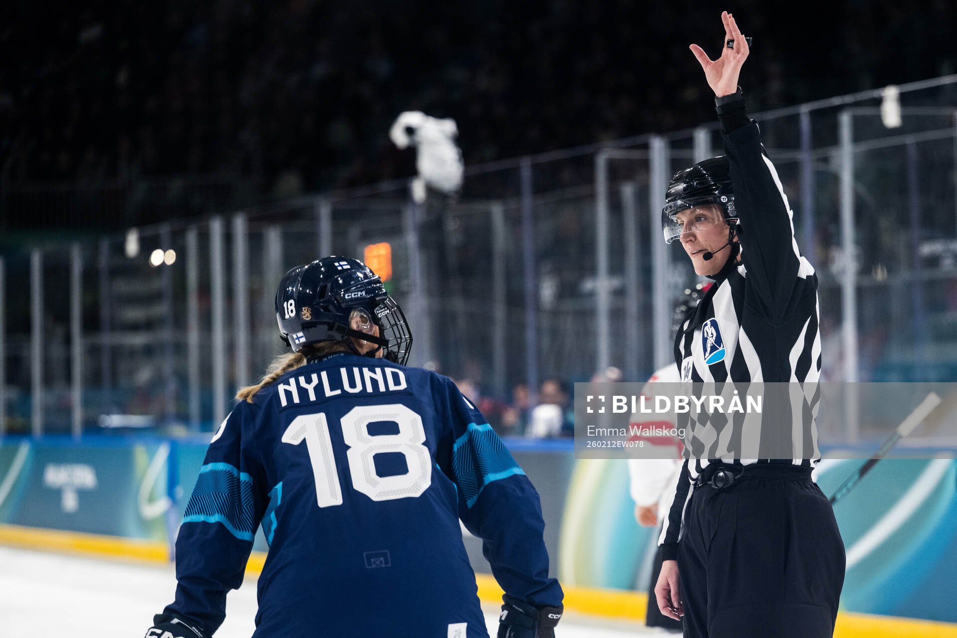 Jenniina Nylund of Finland and Linesperson Jessica Lundgren