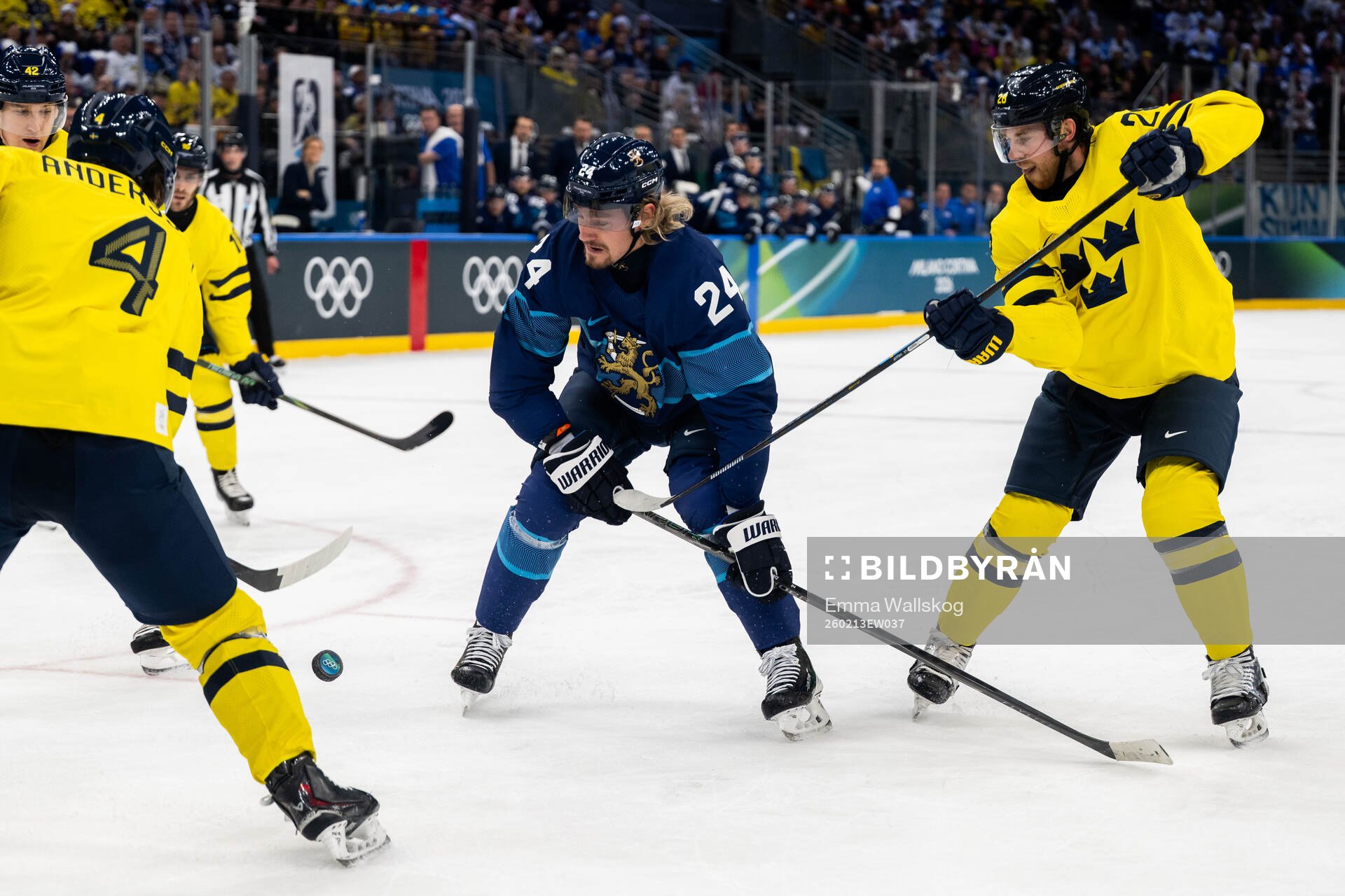 Roope Hintz of Finland and Elias Lindholm of Sweden in the