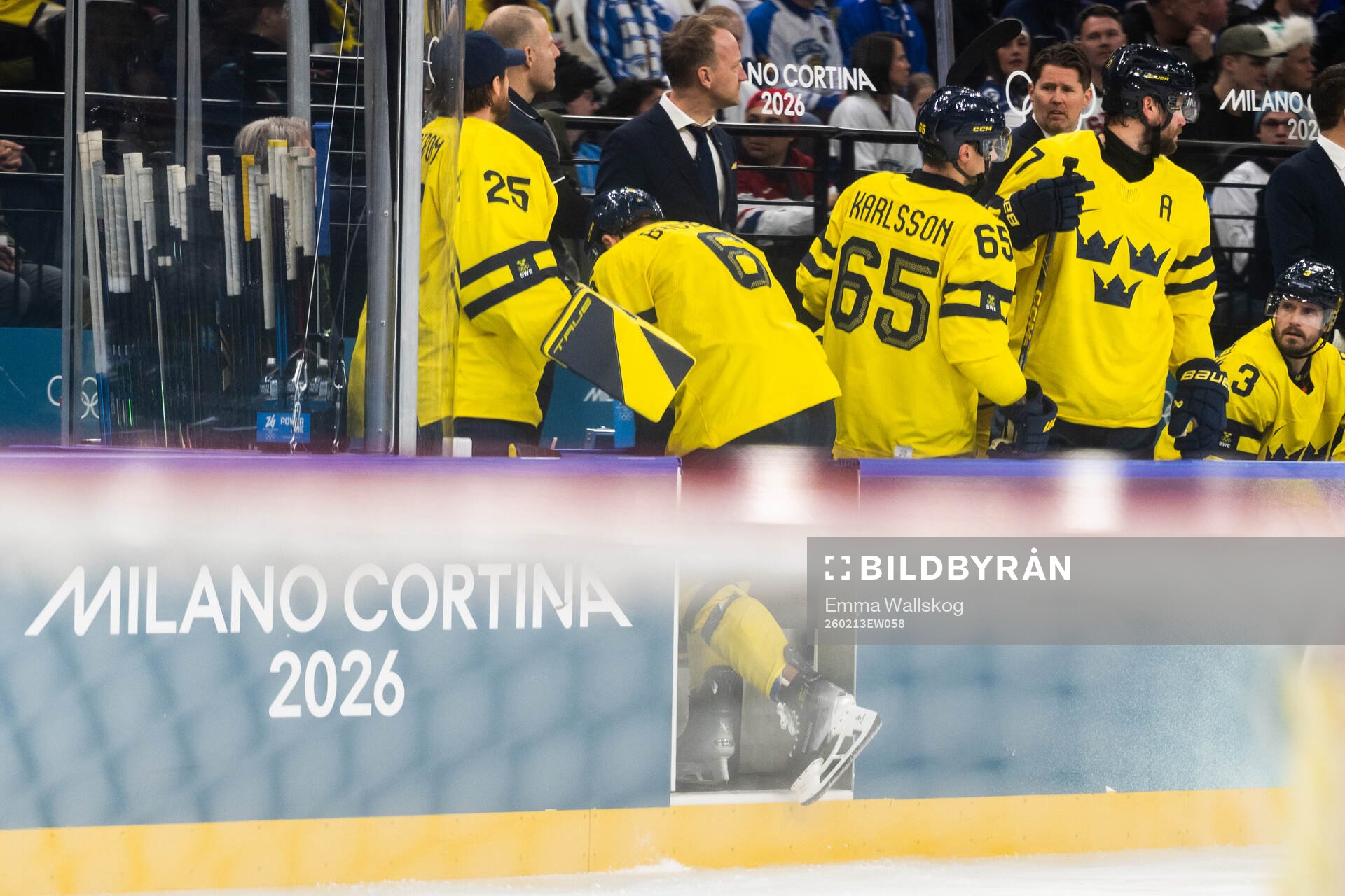 Philip Broberg of Sweden is in pain in the men's ice hockey