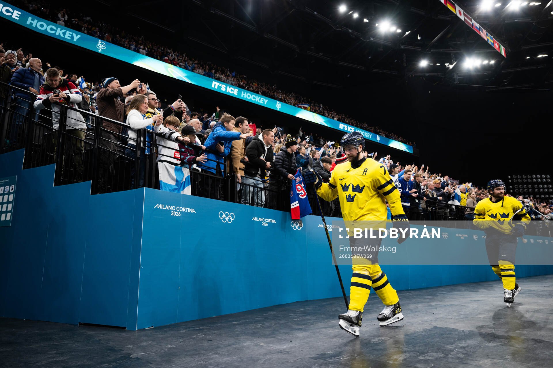 Victor Hedman and Rasmus Andersson of Sweden look dejected
