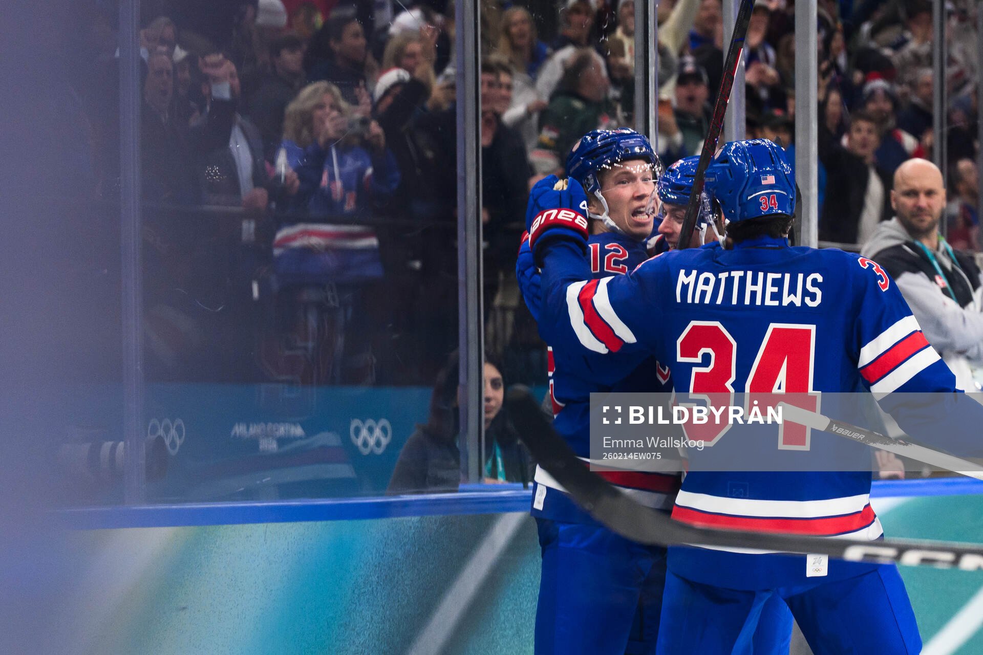 Matt Boldy and Auston Matthews celebrate