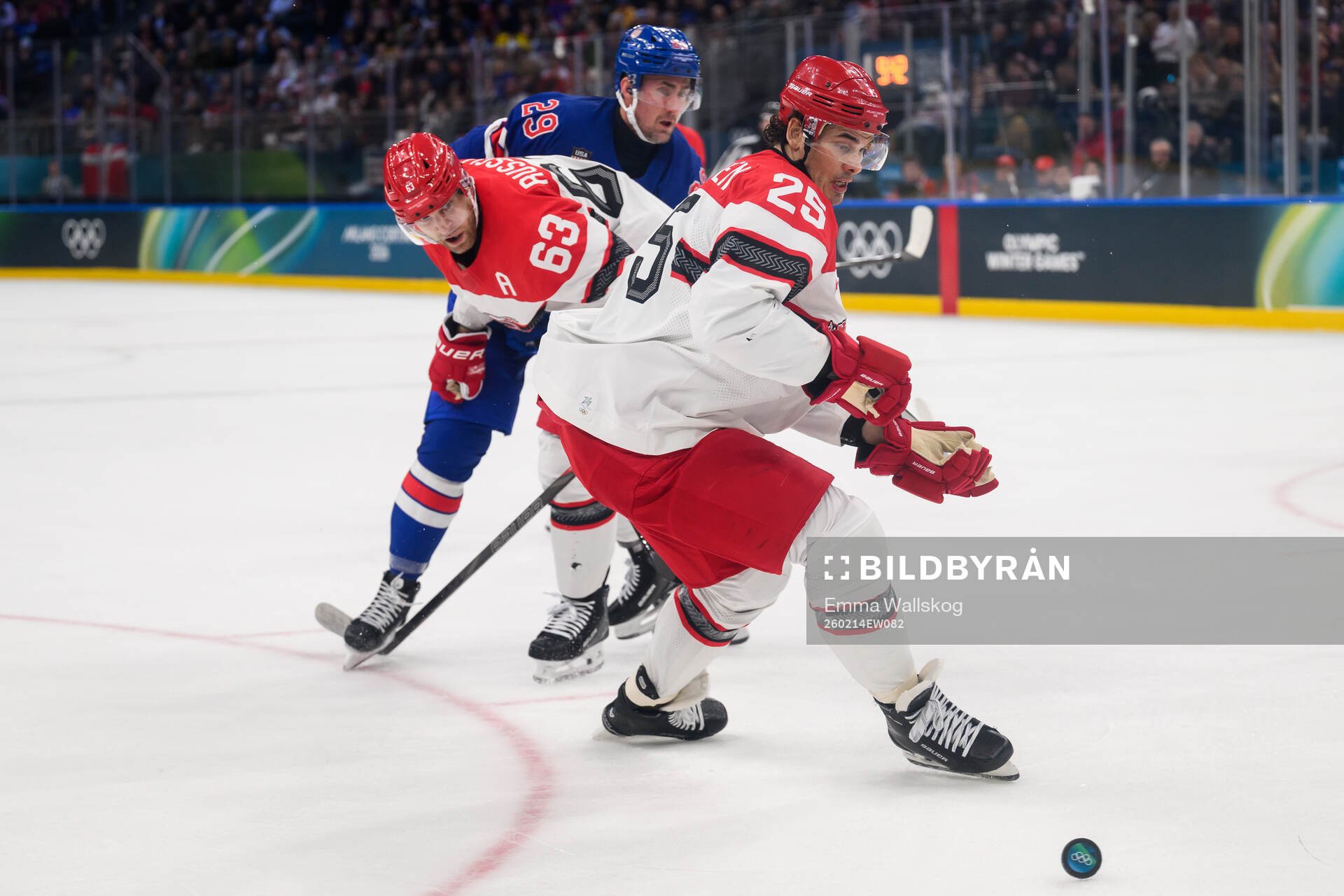 Brock Nelson of USA against Patrick Russell and Oliver