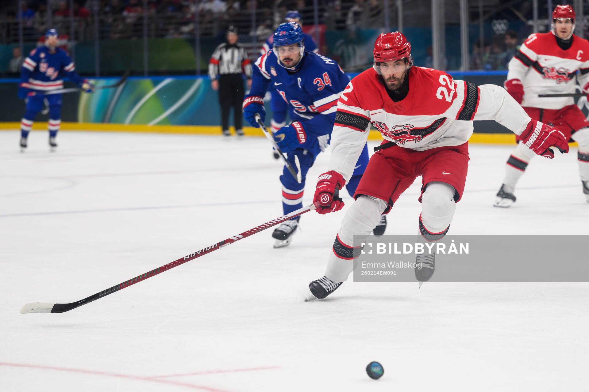 Auston Matthews of USA and Markus Lauridsen of Denmark in