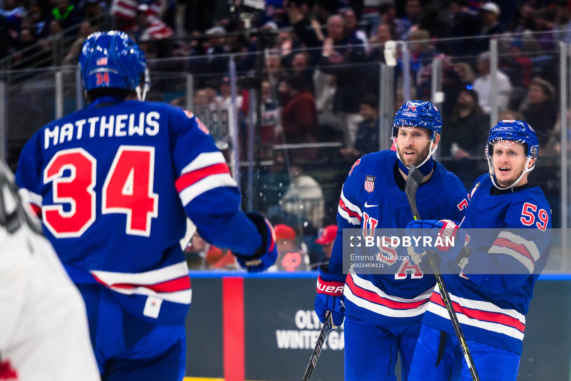 Jake Guentzel and Jaccob Slavin of USA celebrate