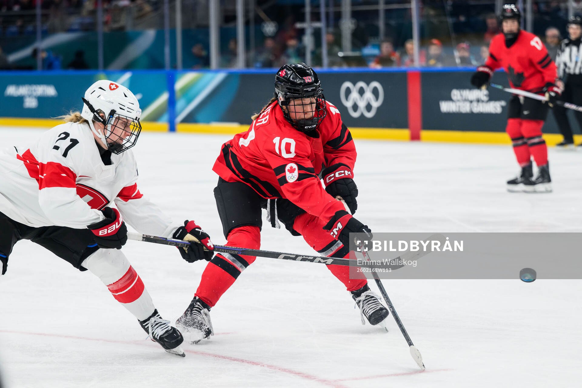 Rahel Enzler of Switzerland and Sarah Fillier of Canada in