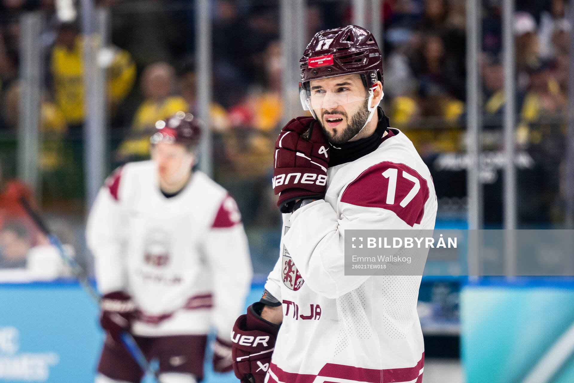 Martins Dzierkals of Latvia looks dejected in the men's ice