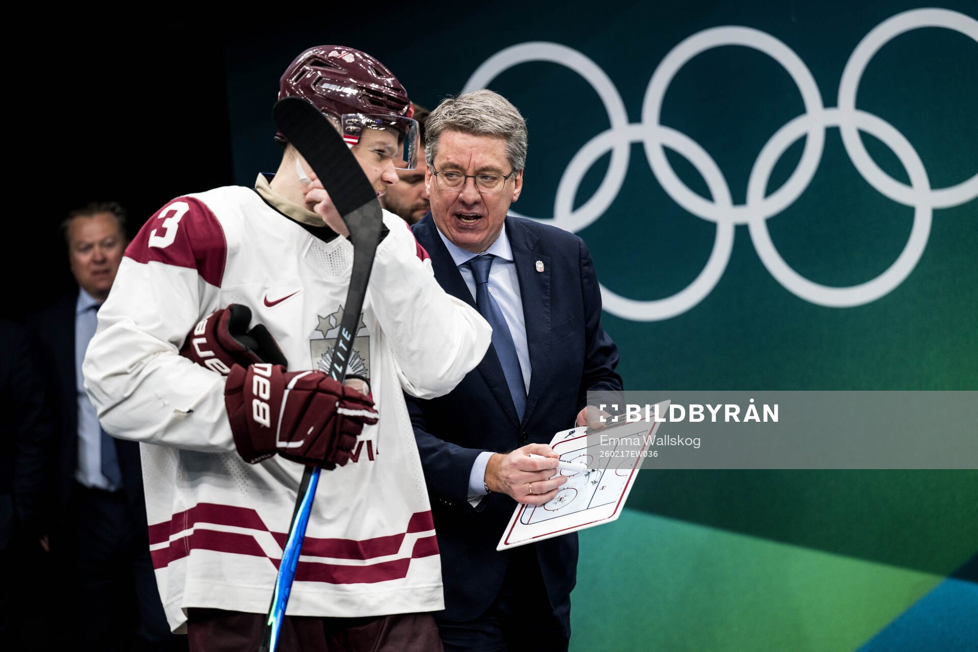 Alberts Smits and head coach Harijs Vitolins of Latvia in