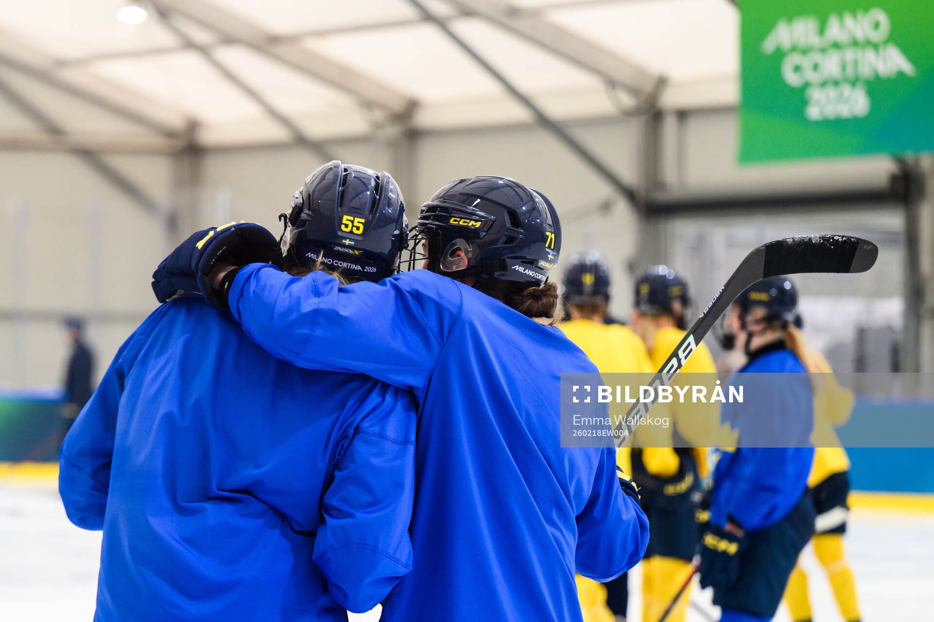 Jenna Raunio and Anna Kjellbin of Sweden at an ice hockey