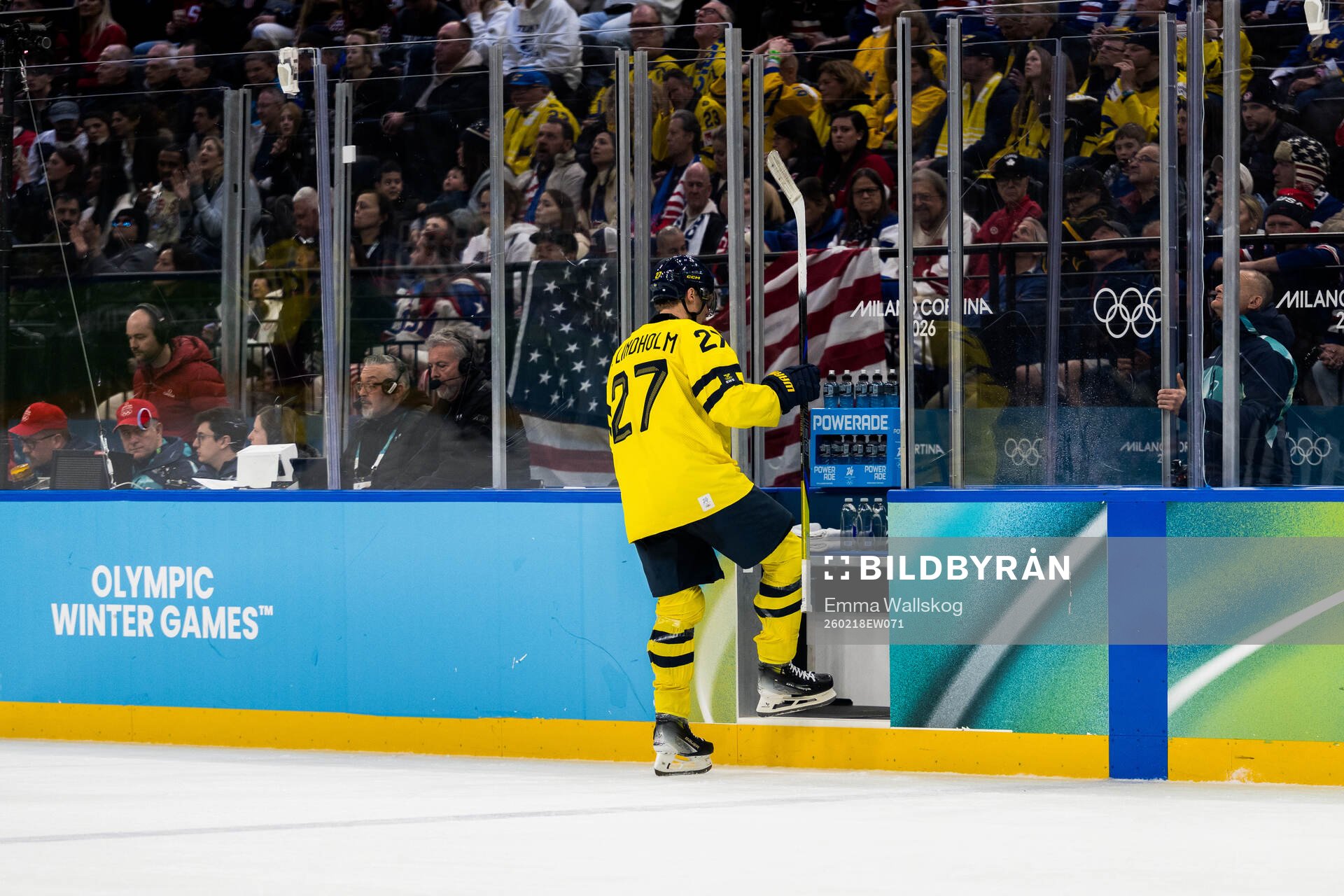 Hampus Lindholm of Sweden receives a penalty in the men's