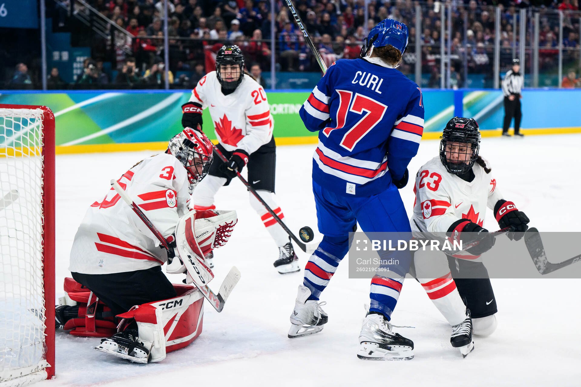 goaltender Ann-Renee Desbiens and Erin Ambrose of Canada