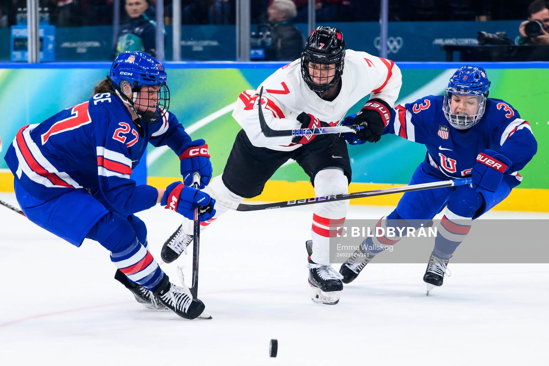 Laura Stacey of Canada against Taylor Heise and Cayla