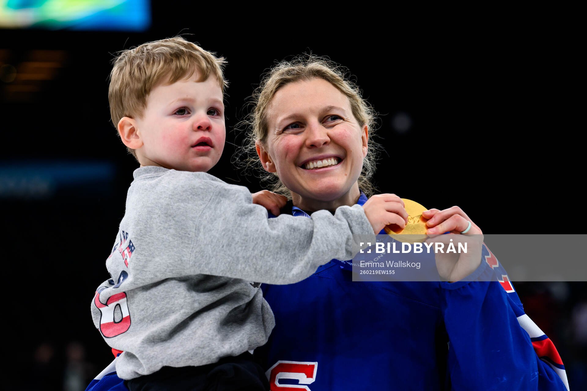 Kendall Coyne of USA celebrates with her gold medal
