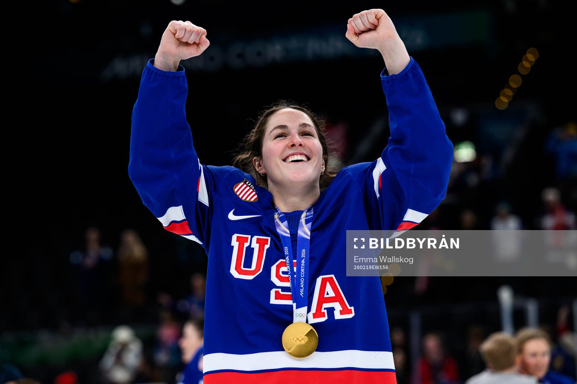 Abbey Murphy of USA celebrates with her gold medal