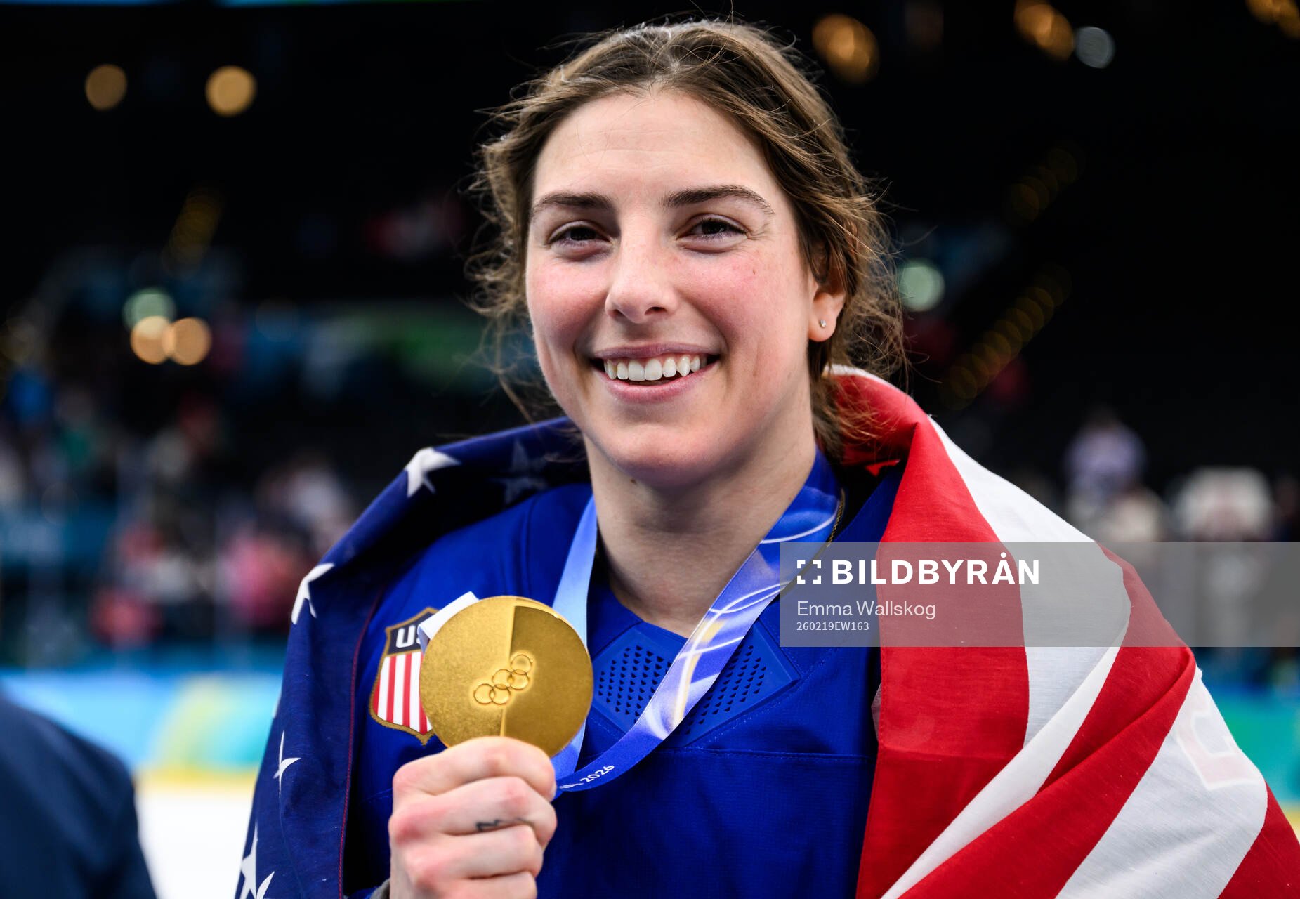 Hilary Knight of USA celebrates with her gold medal