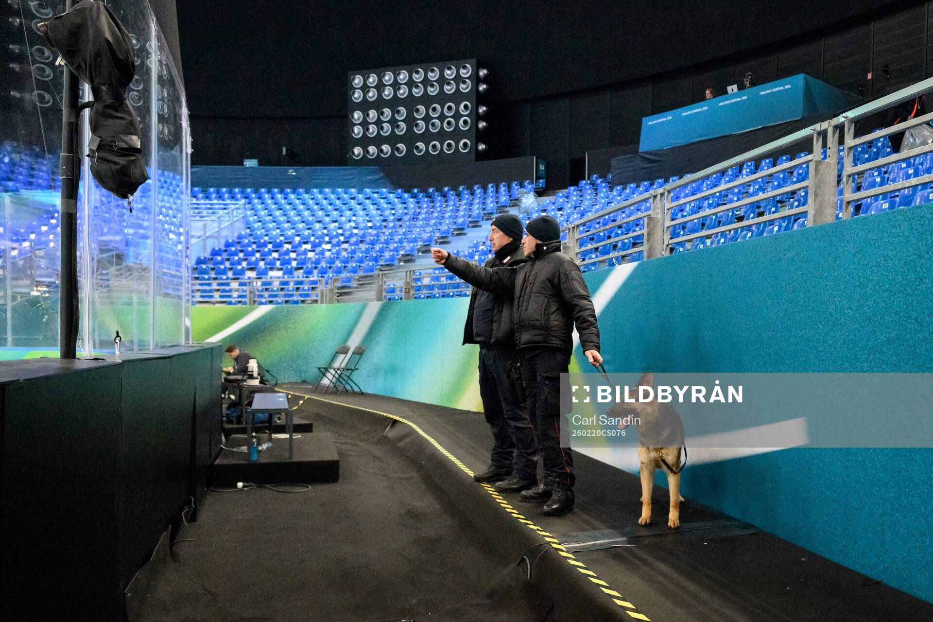 Security personnel with a dog in Milano Santagiulia Ice