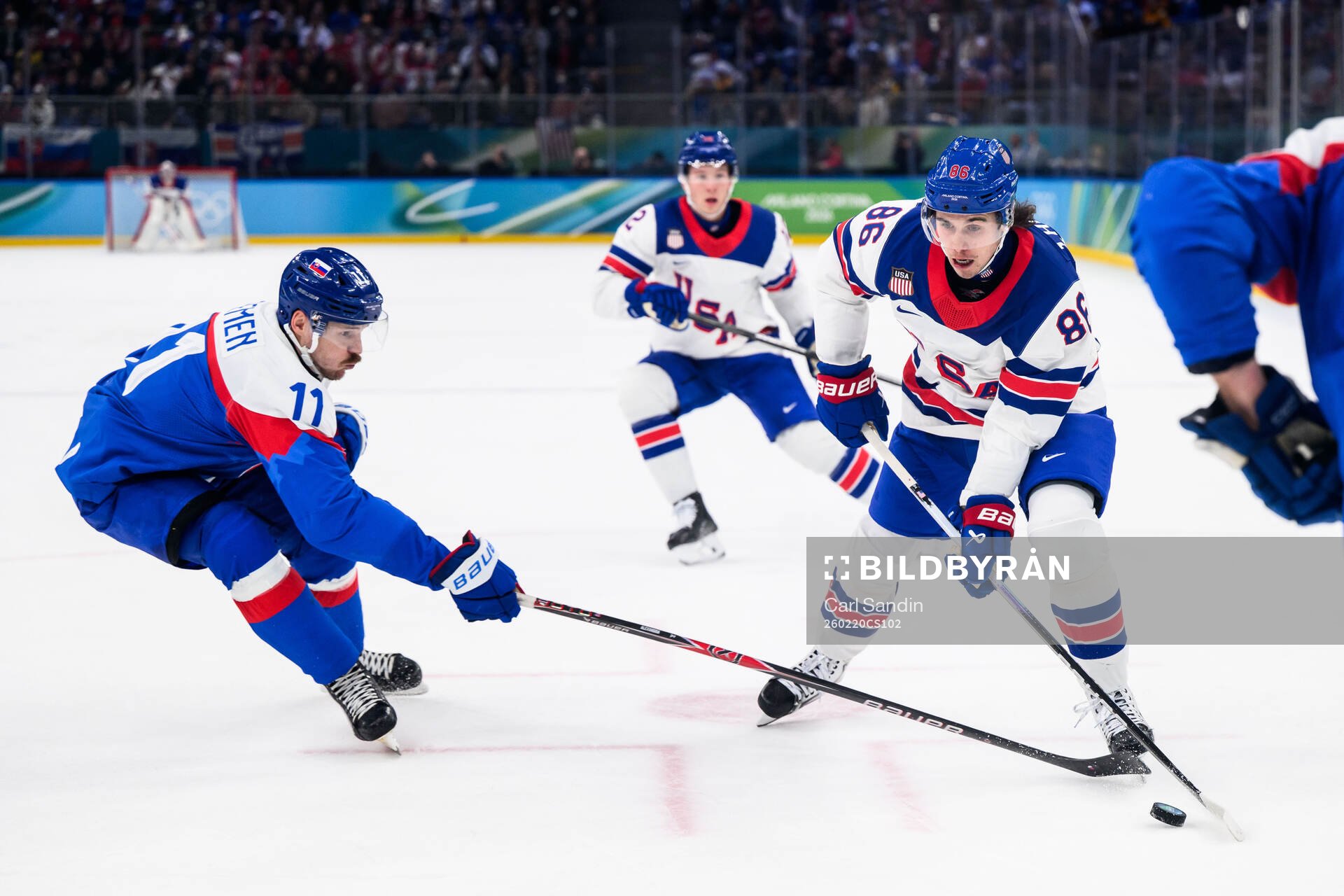 Milos Kelemen of Slovakia and Jack Hughes of USA in the