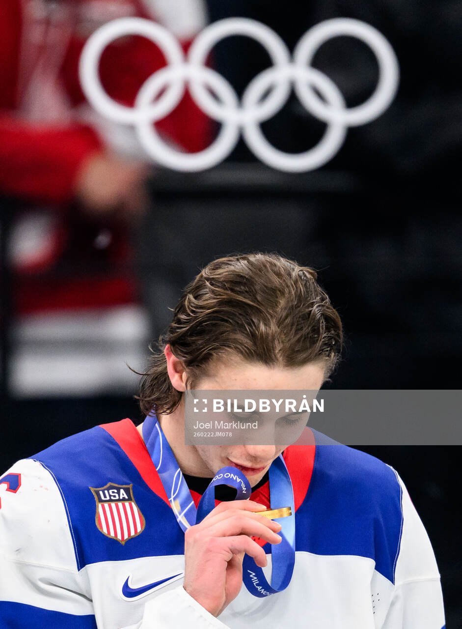 Jack Hughes of USA celebrates with his gold medal