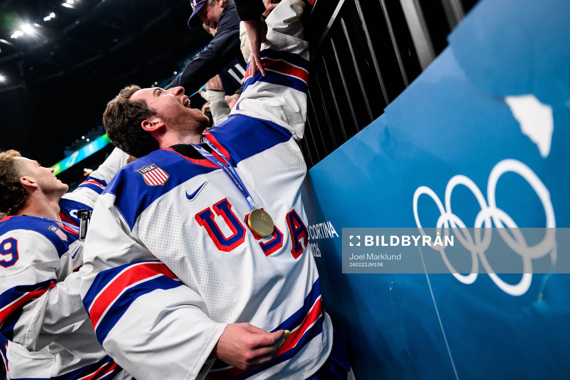 Jeremy Swayman of USA celebrate