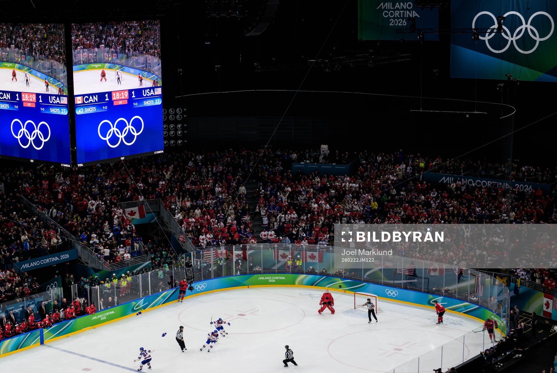 Dylan Larkin, Zach Werenski and Jack Hughes of USA