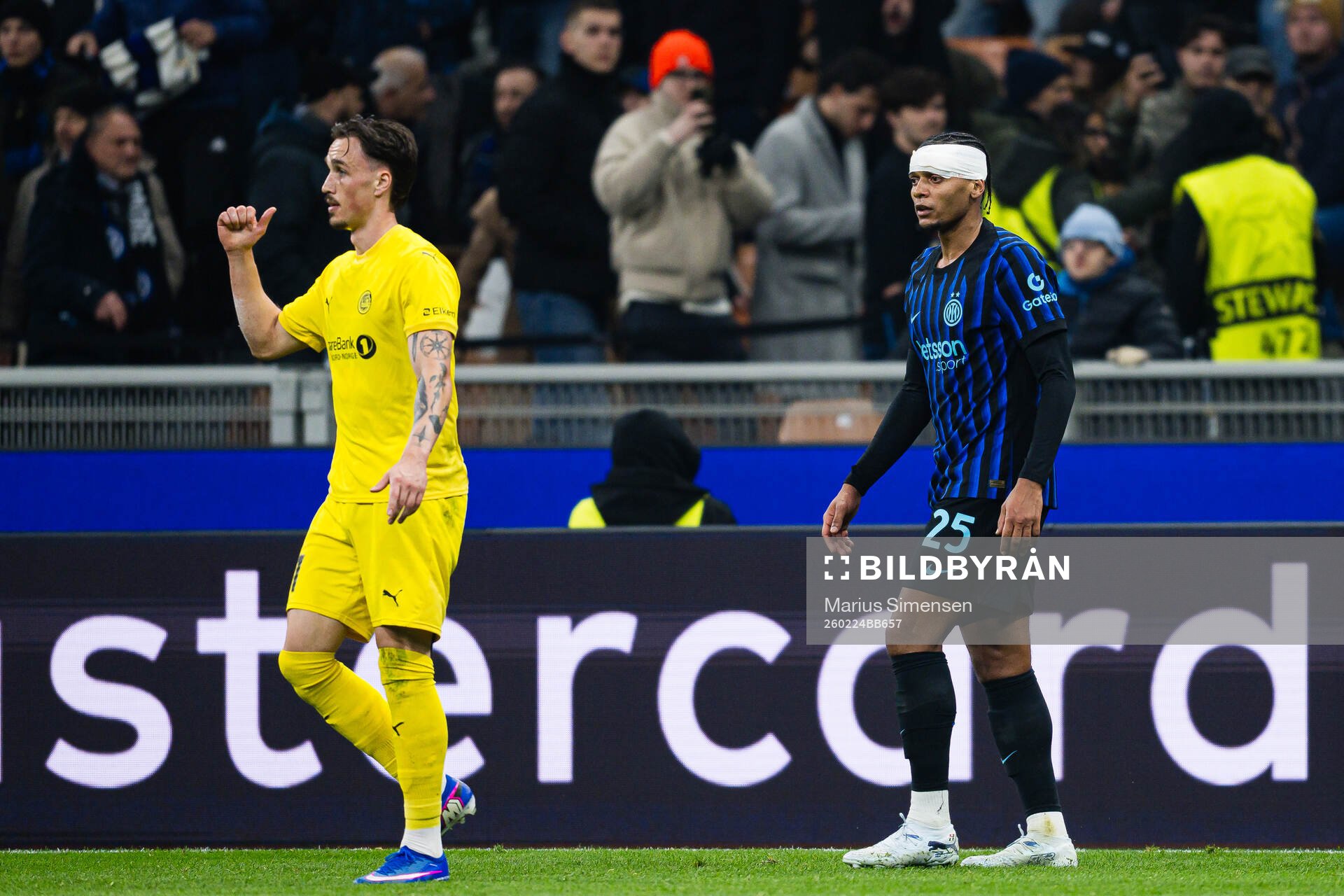Andreas Helmersen of Bodø/Glimt and Manuel Akanji of Inter