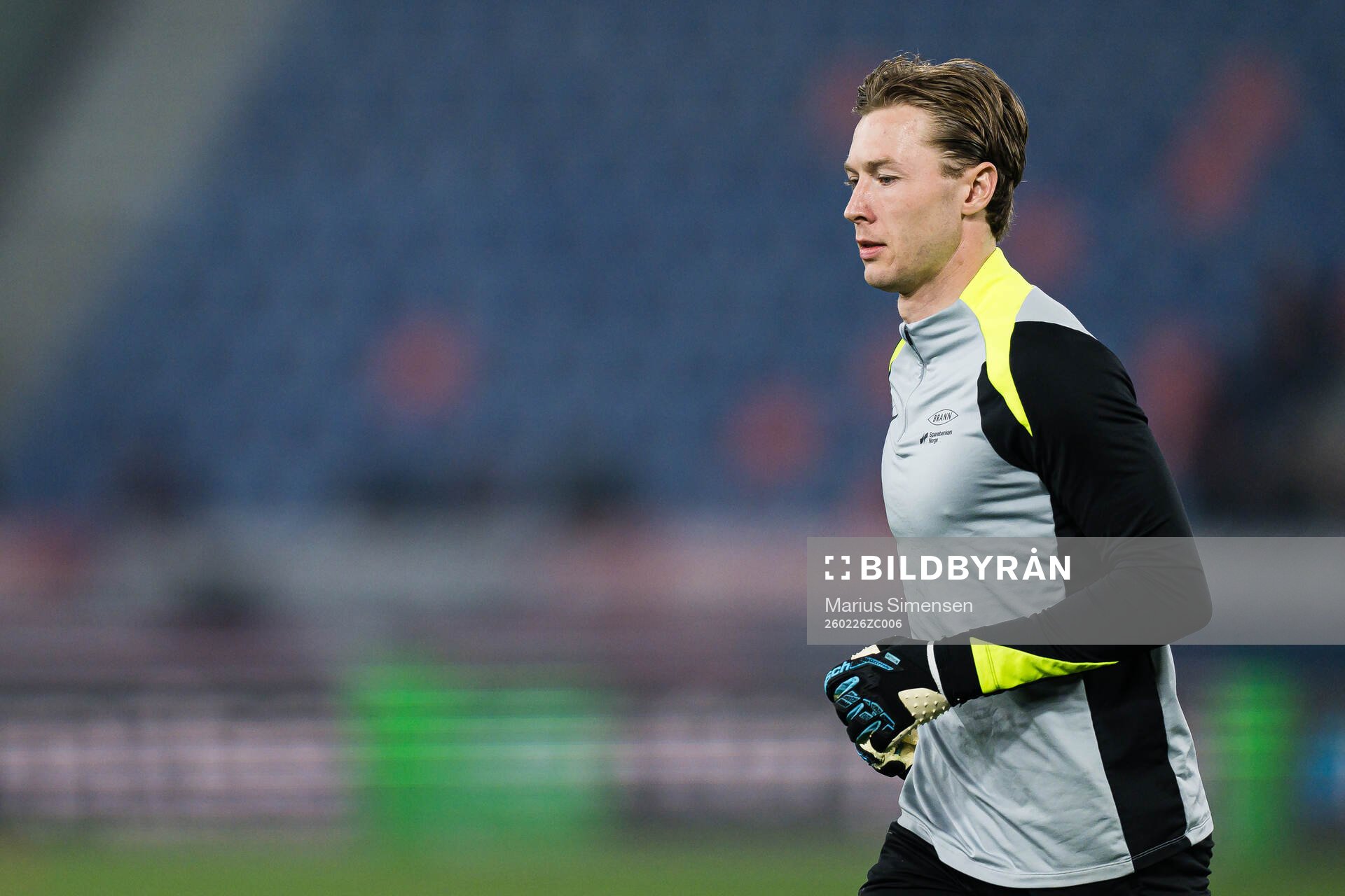 Goalkeeper Mathias Dyngeland of Brann warms up