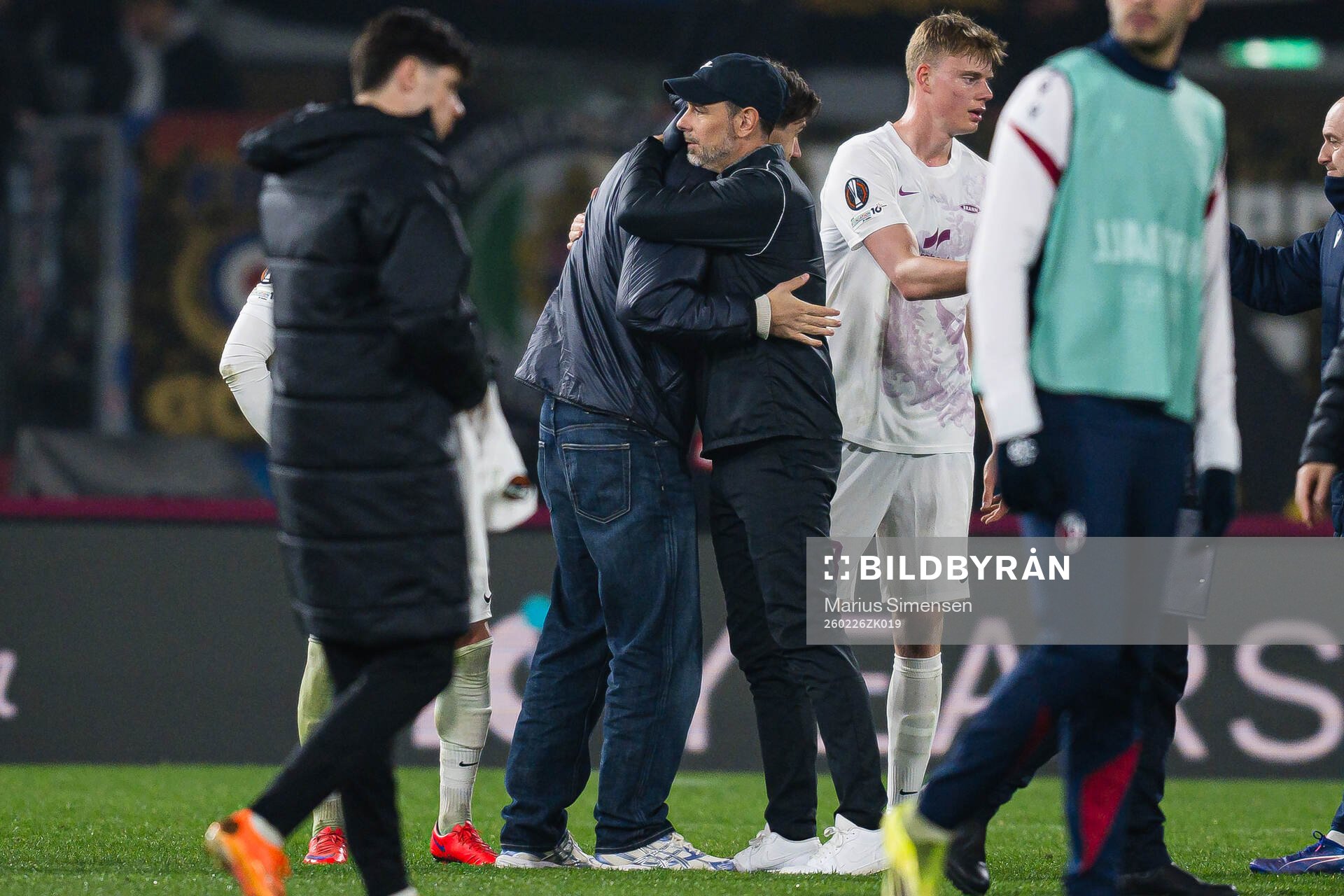 Eivind Helland of Bologna and head coach Freyr