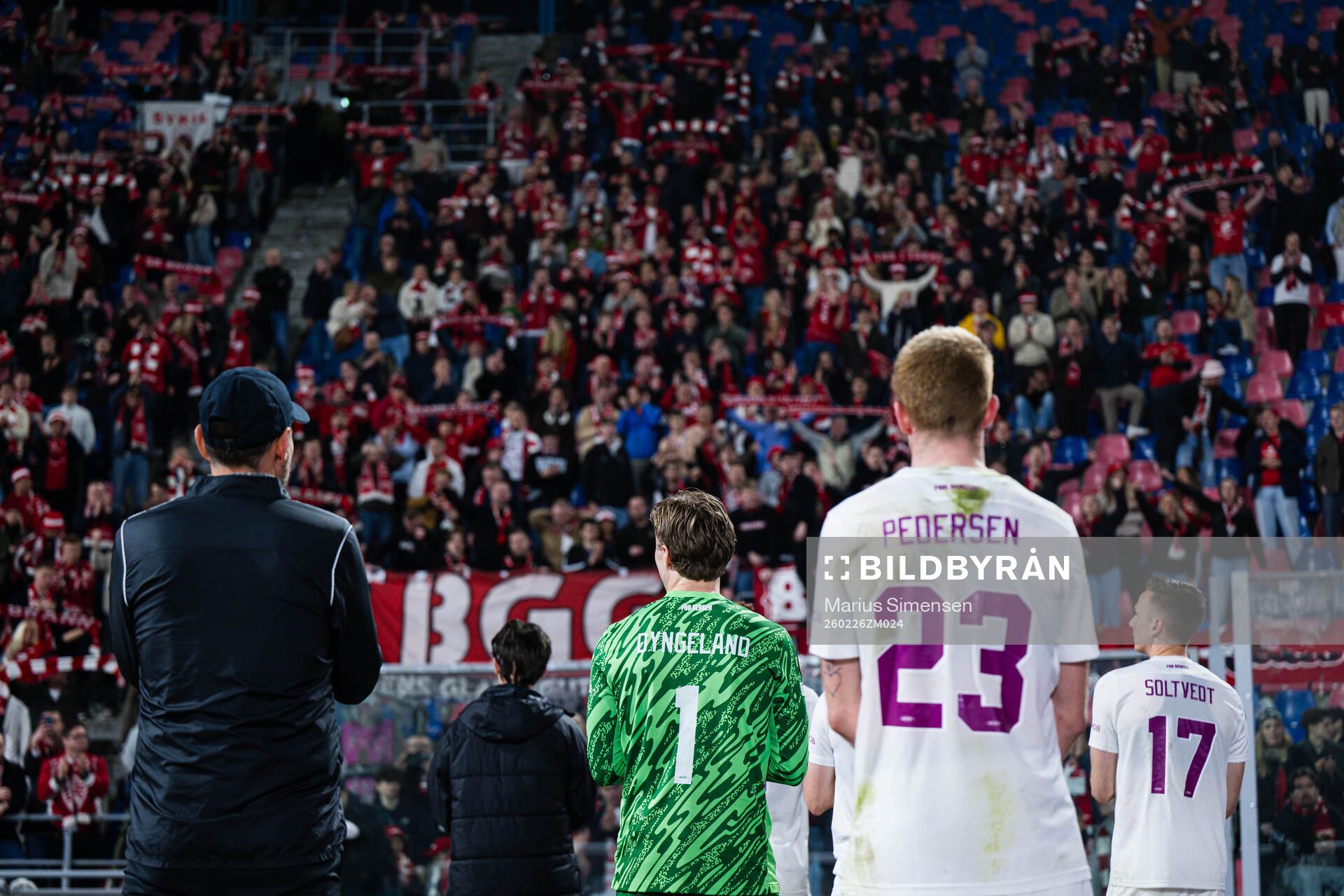 Head coach Freyr Alexandersson, goalkeeper Mathias