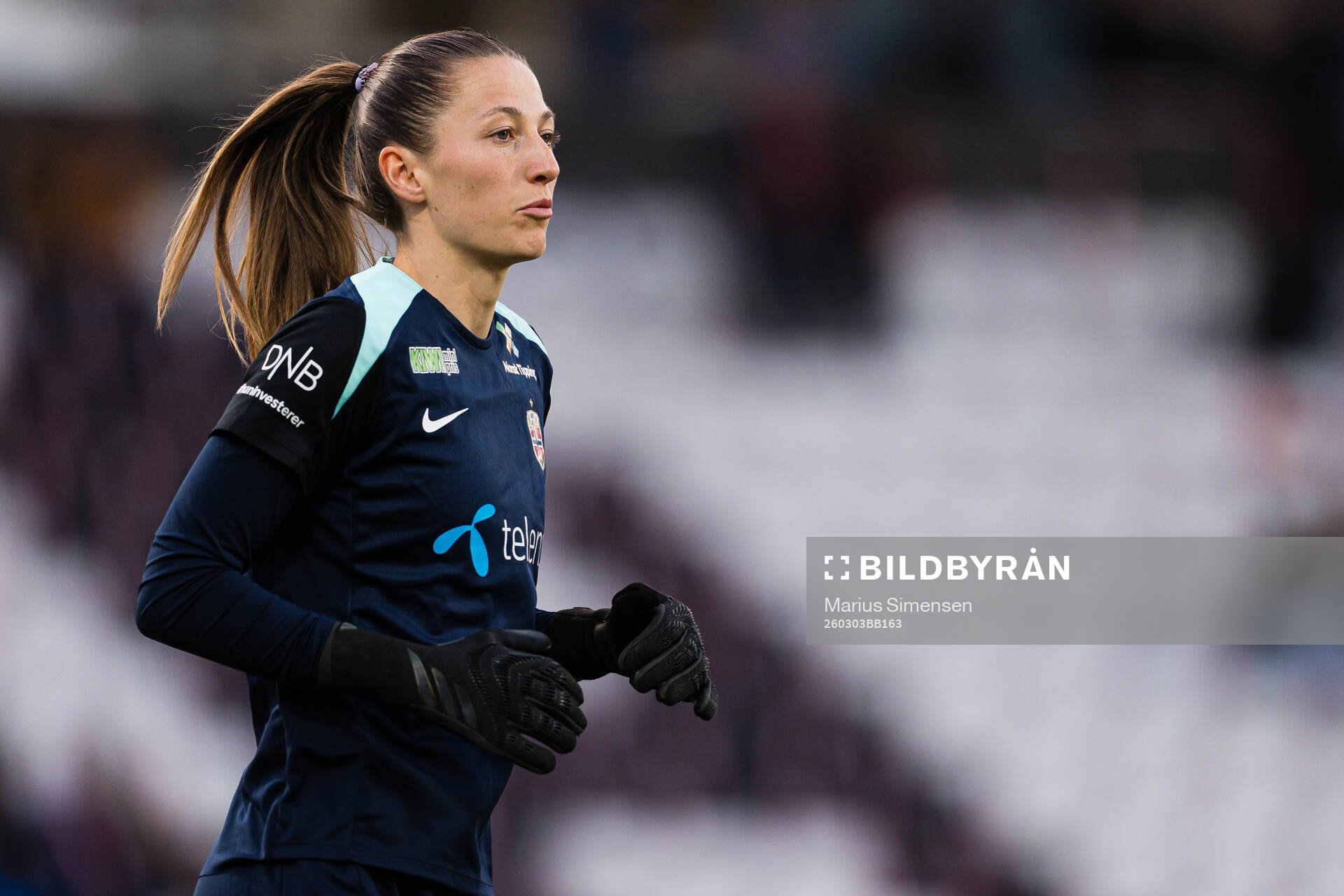 Goalkeeper Cecilie Hauståker Fiskerstrand of Norway warms
